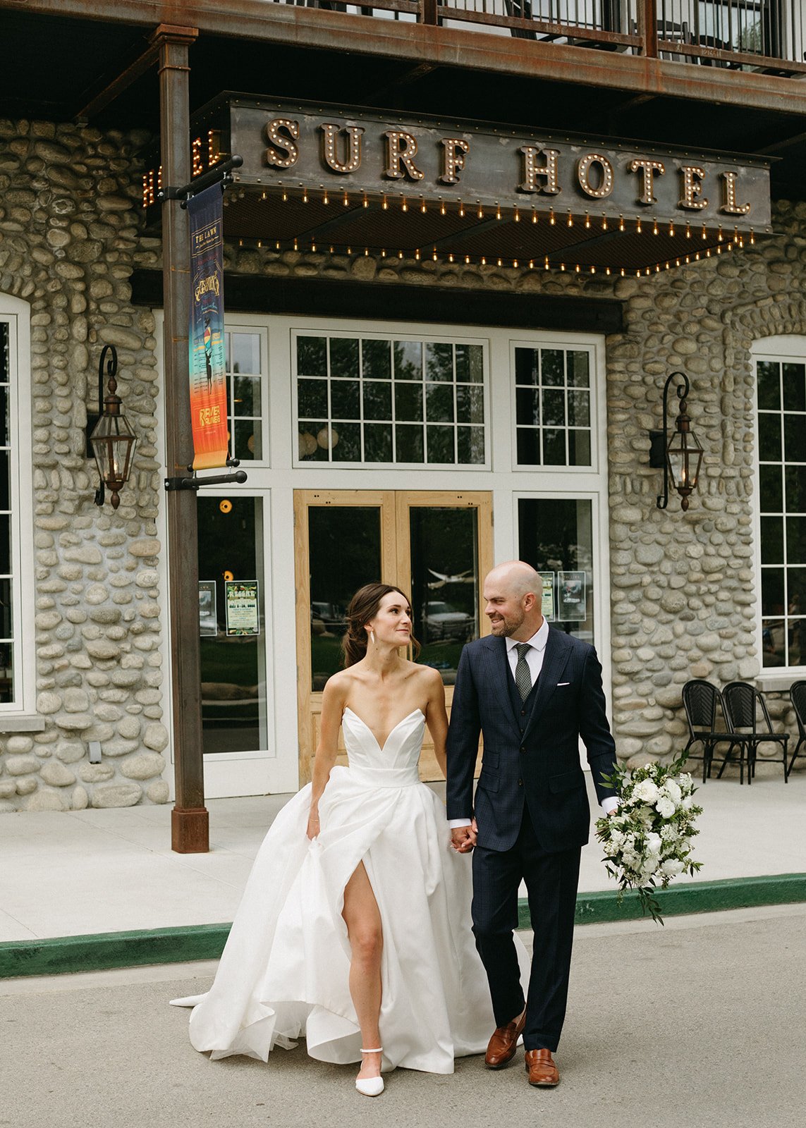 a bridal portrait in front of the surf hotel featuring a ball gown by ines di santo