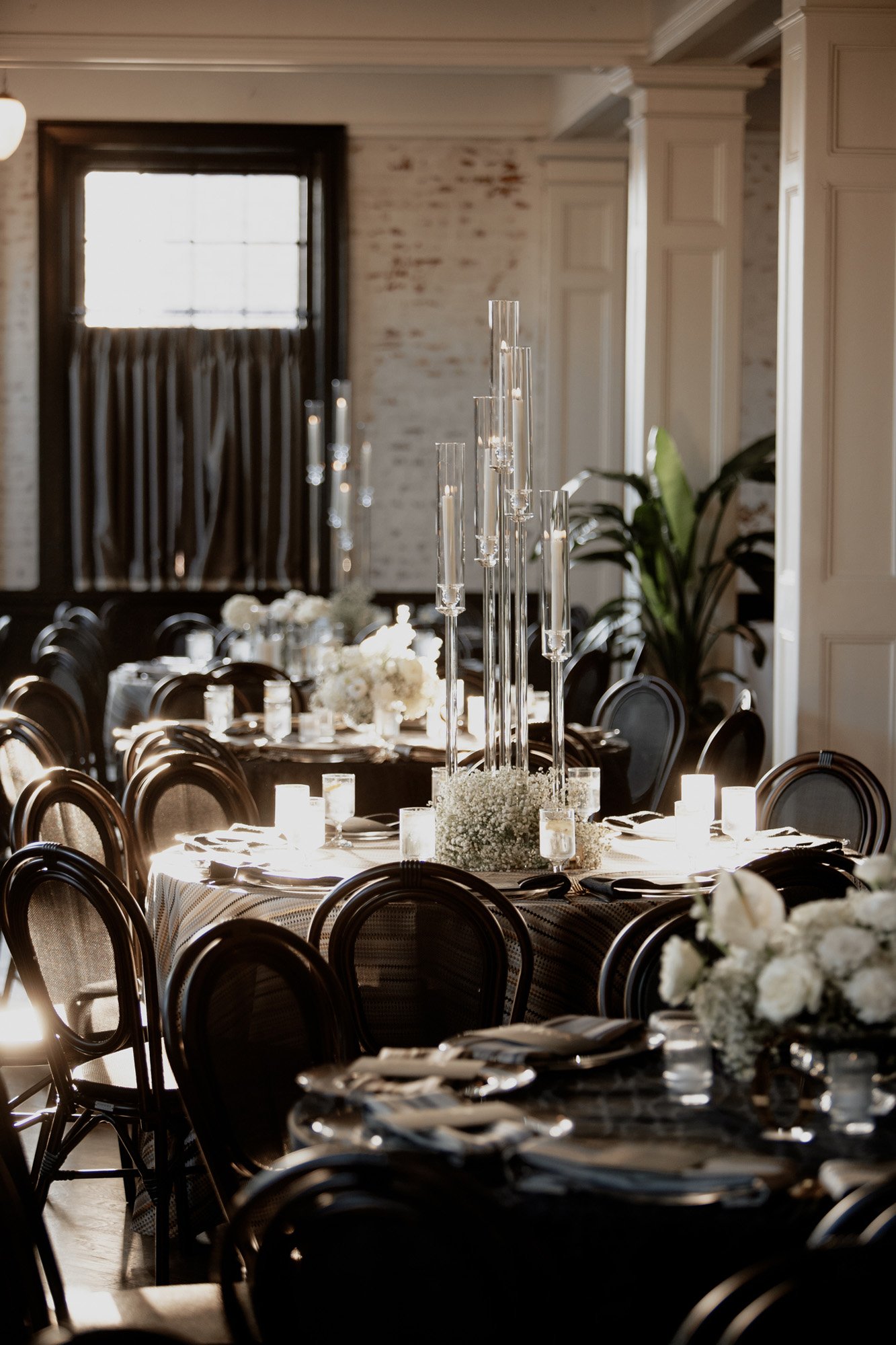 a inviting and warm candle lit reception at this wedding at the mason in dallas texas.