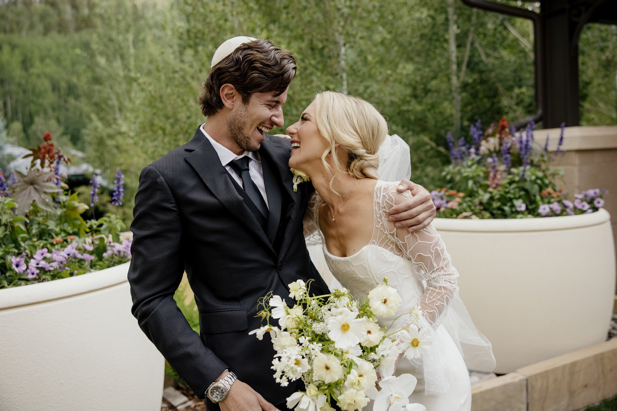 a jewish modern wedding featuring a beaded alexandra grecco wedding dress from anna be bridal boutique