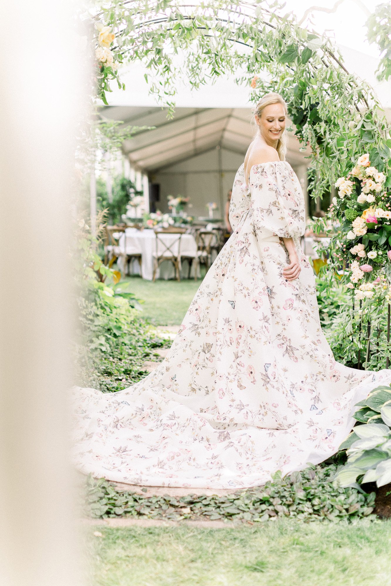 a garden themed wedding in minnesota featuring a stunning floral ball gown by monique lhuillier.