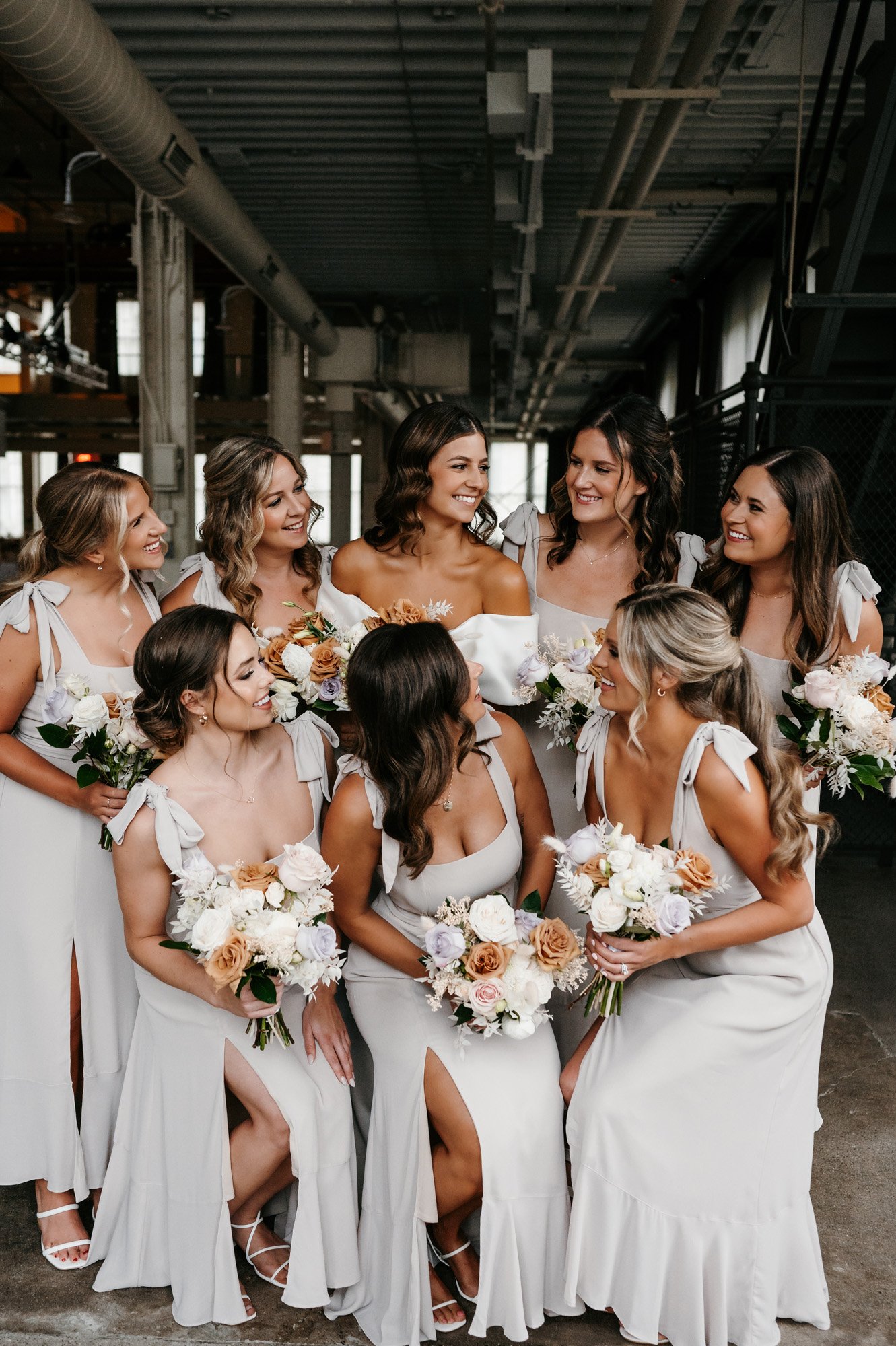 the modern bride and bridesmaids photo featuring an eva lendel wedding dress from anna be bridal boutique