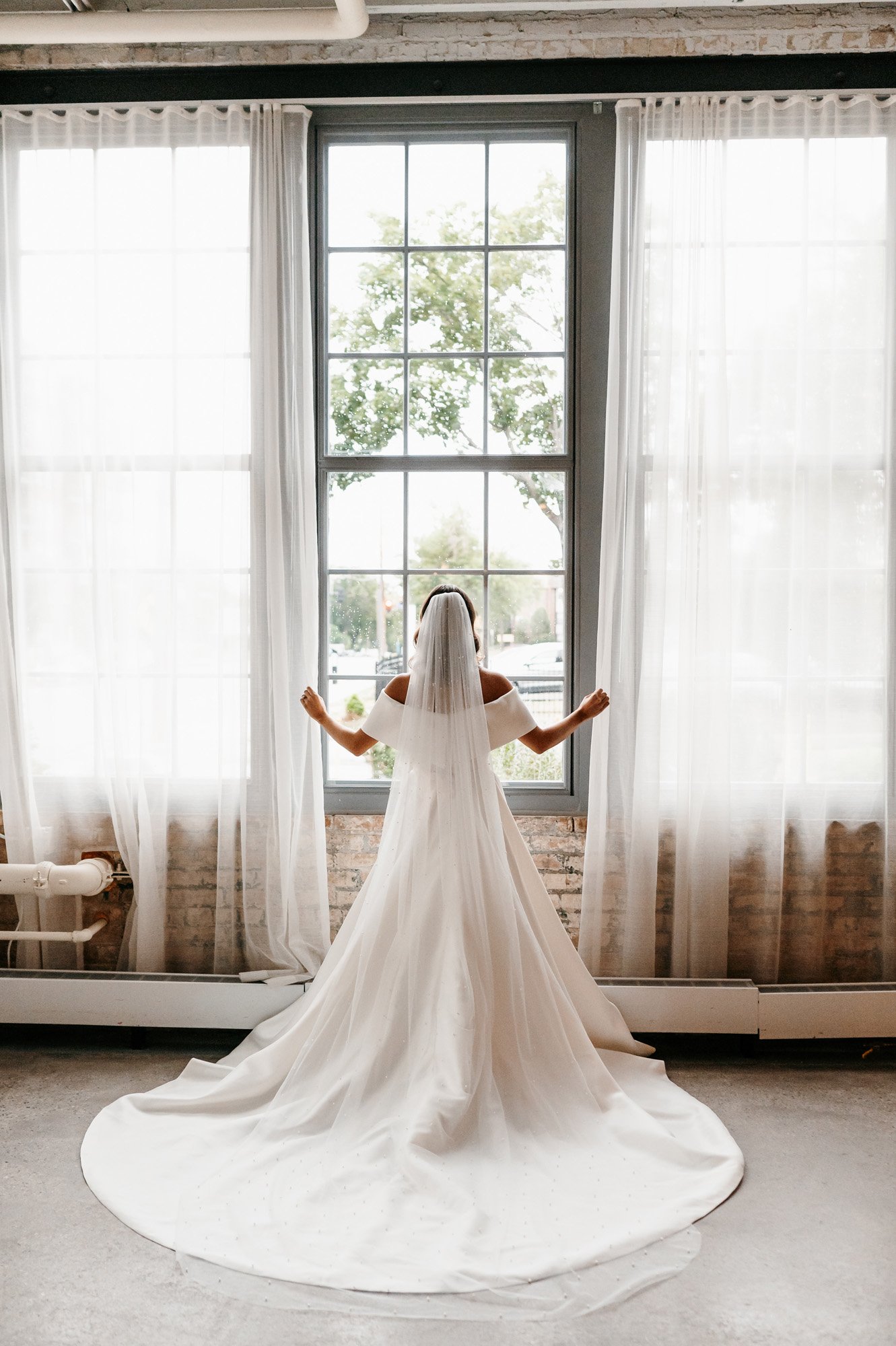 this dramatic bridal portrait featuring a eva lendel wedding dress