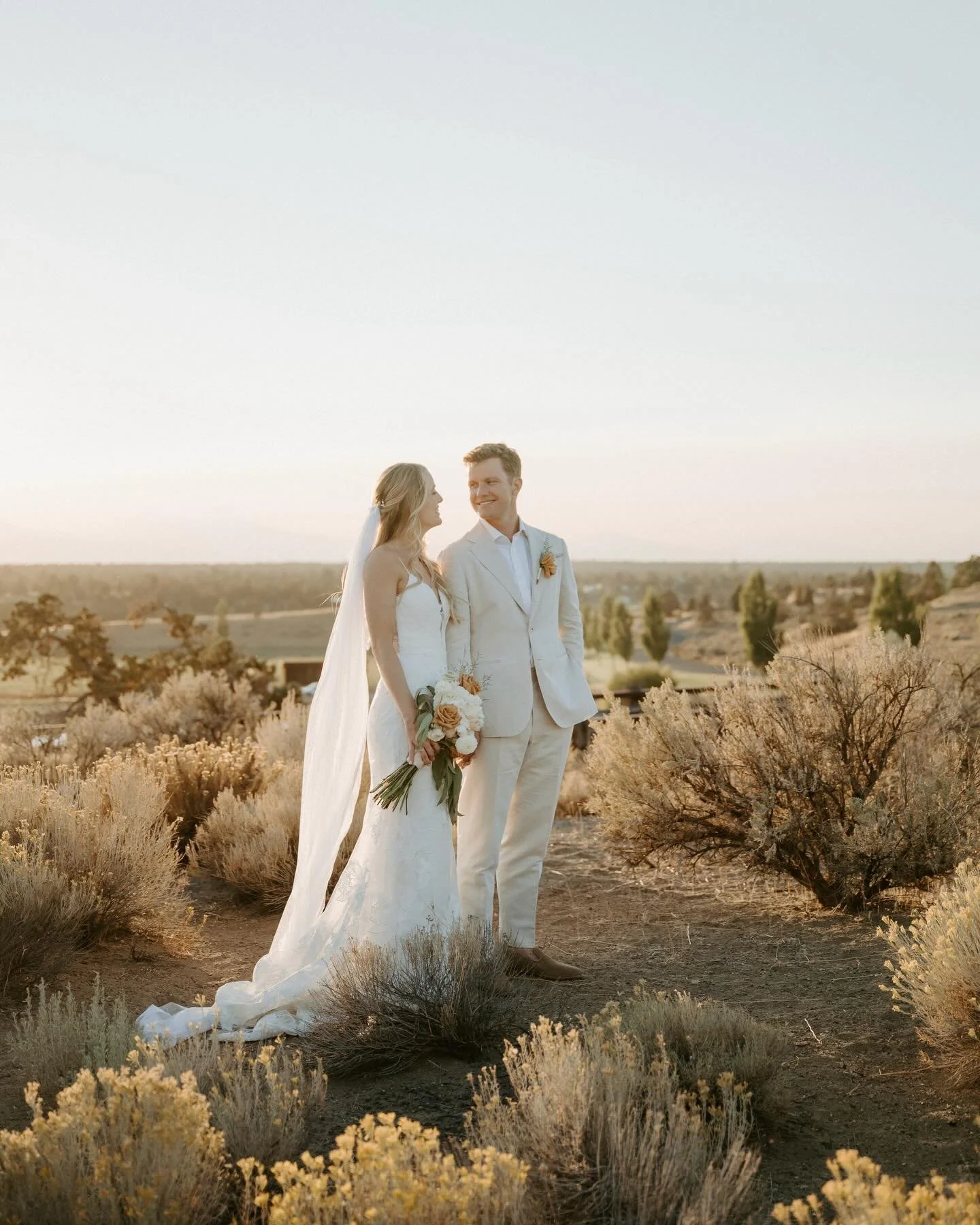 a&amp;b&eacute; real bride cali &amp; kjell in @madilanebridal 🤍 this day was oh so dreamy and we love how warm these photos feel 🥹

dress | daria by @madilanebridal via @aandbebridalshop #seattle

photos | @anaispossamai

venue | @brasadaranch @br