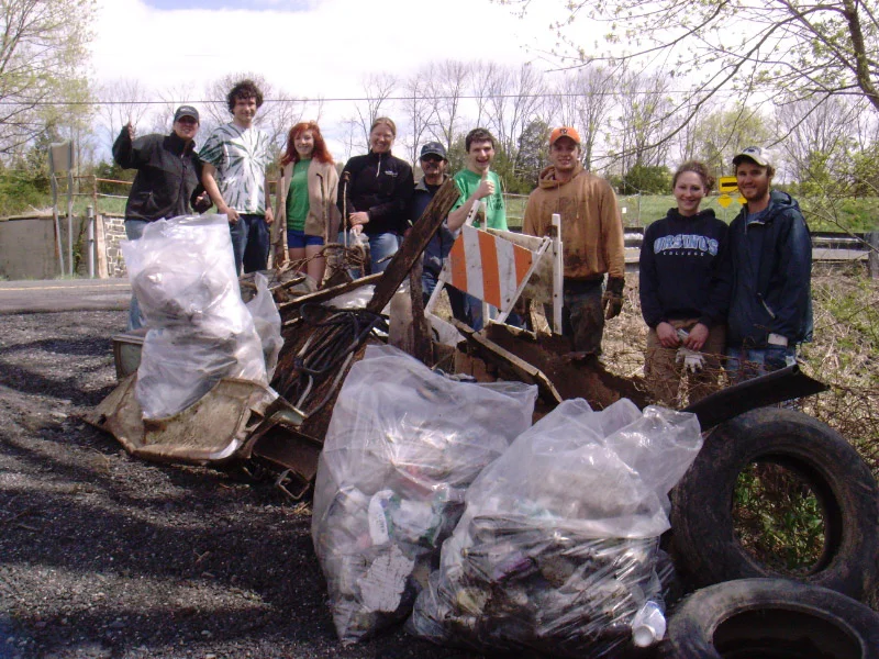 collecting trash during the stream clean-up