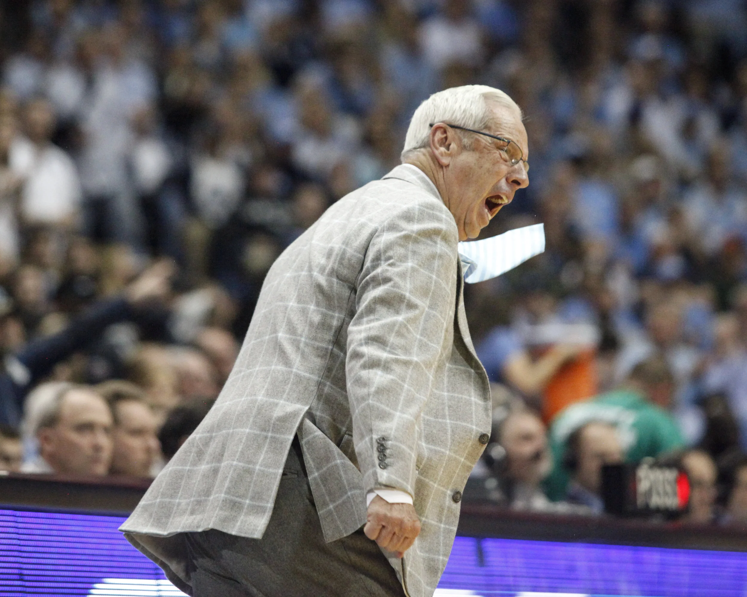 UNC head coach Roy Williams’ tie flies as he stomps during the game at the Dean Smith Center.