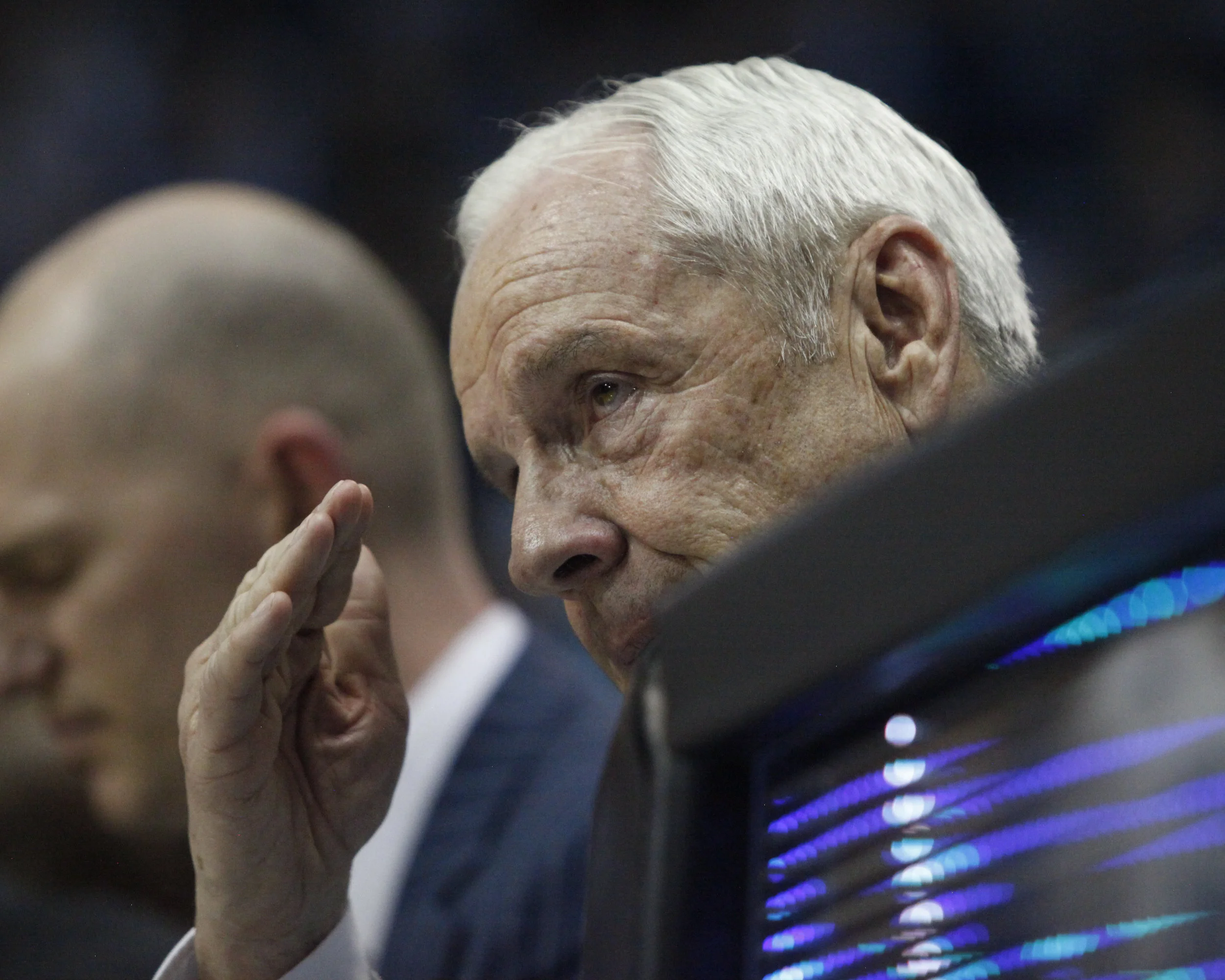 UNC head coach Roy Williams salutes senior Theo Pinson during Senior Night at the Dean Smith Center.