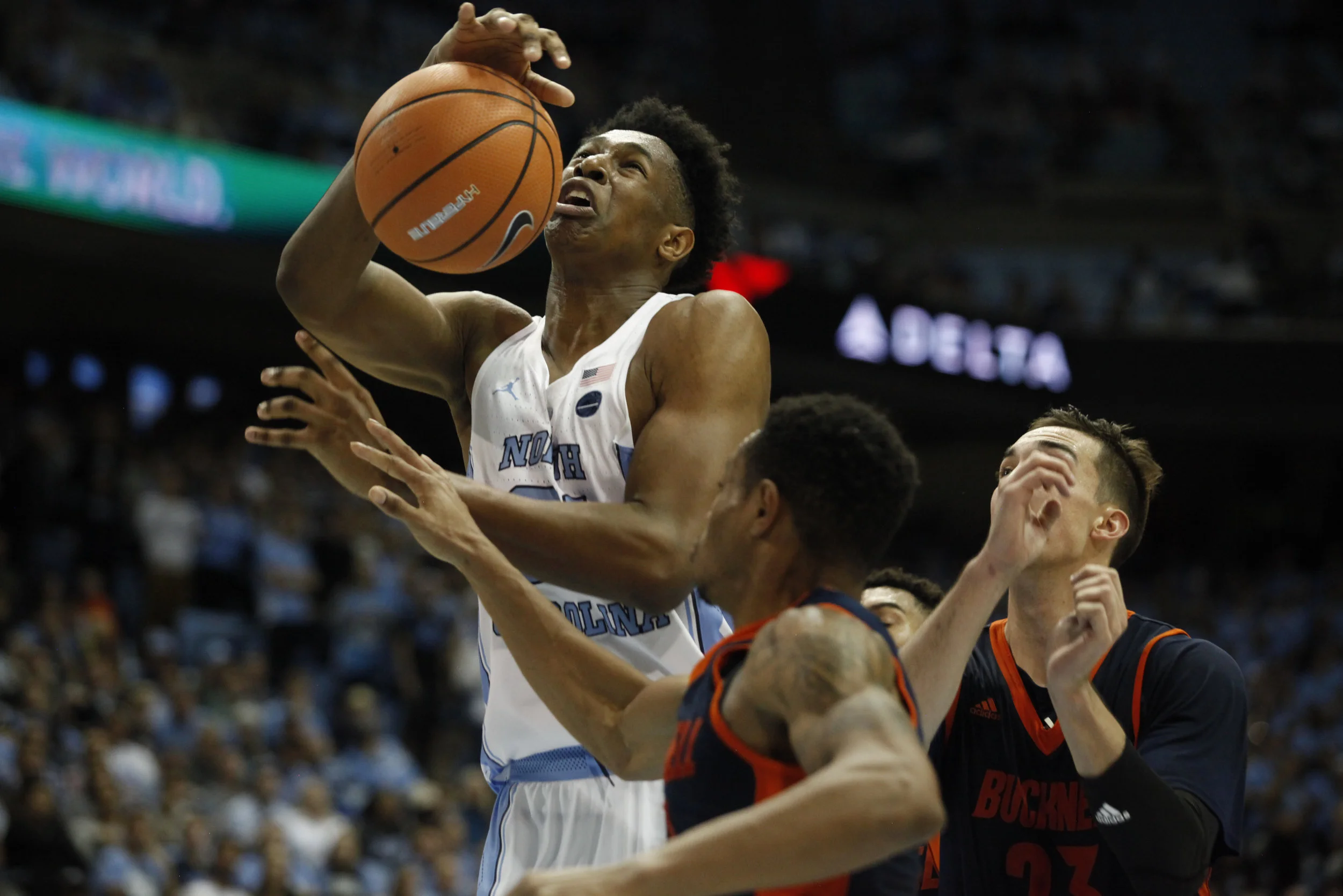 UNC forward, Sterling Manley, is fouled while going up to the basket during the game against Bucknell.