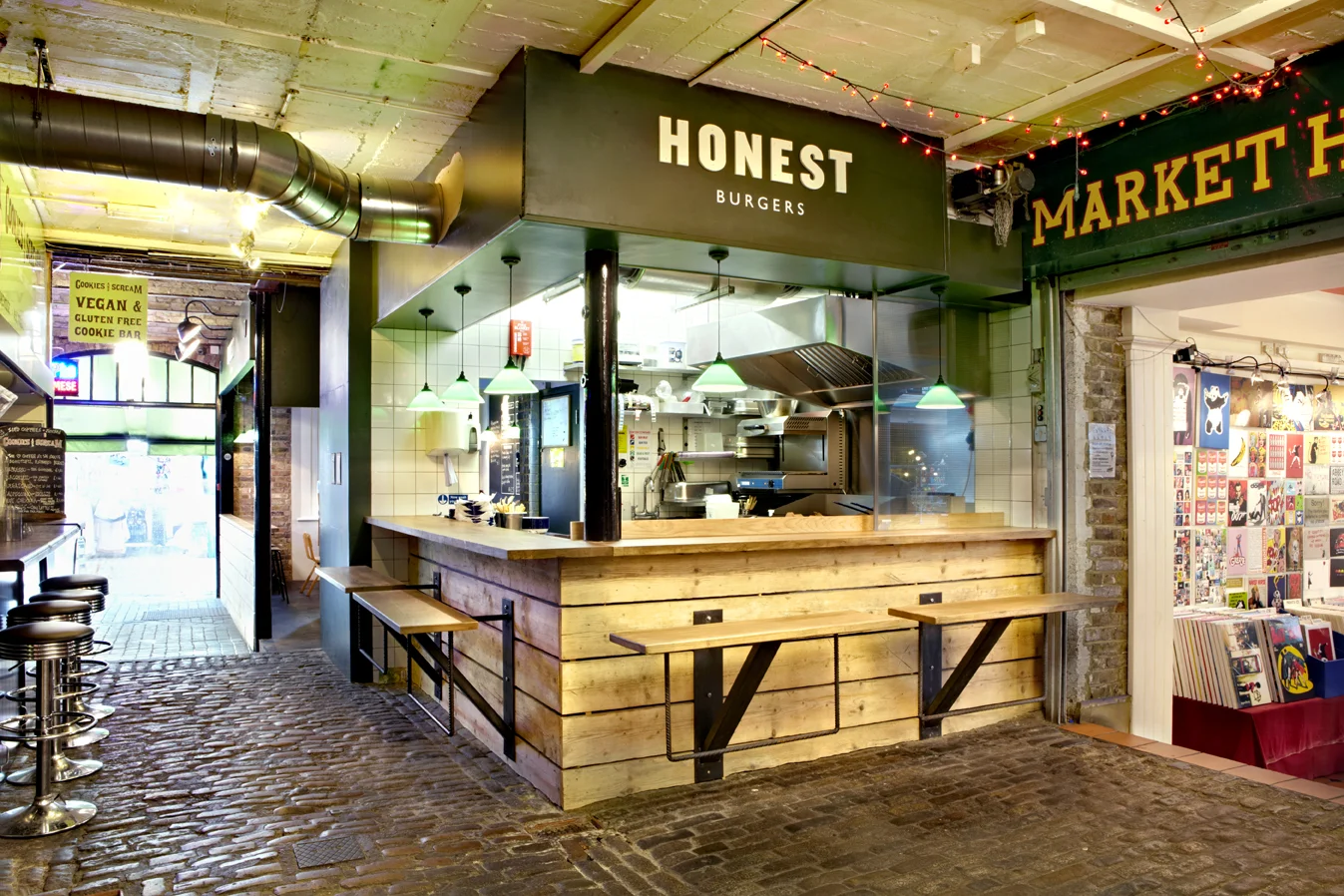 Seating indoors, outdoors and at the bar right by the kitchen.