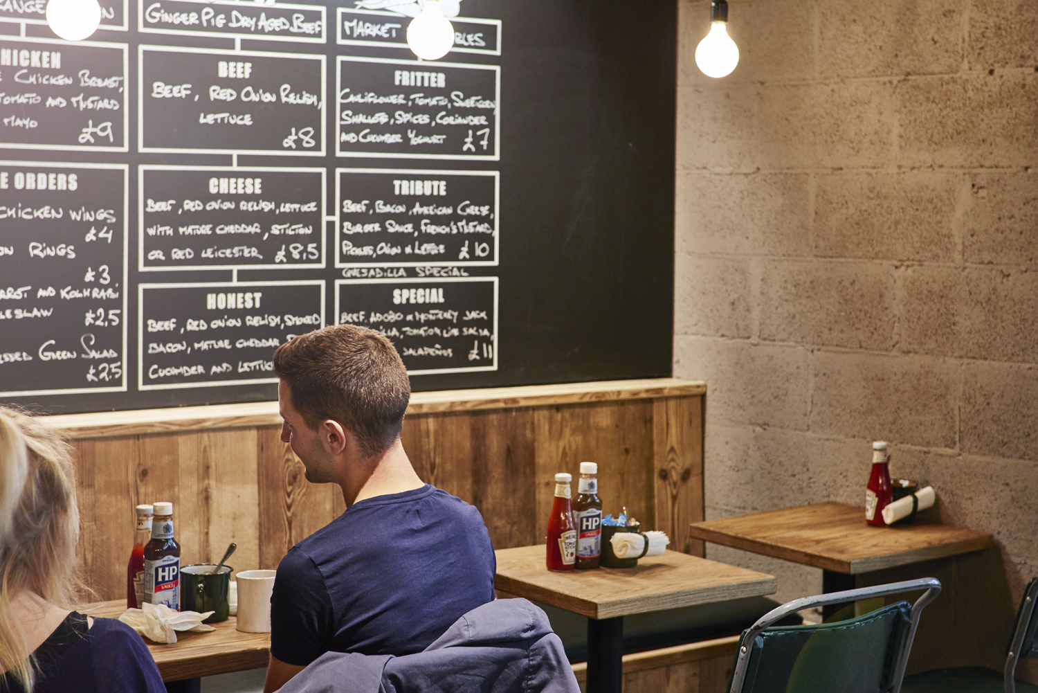 Honest Burger's new location in Liverpool Street. Imagery and Photography by London based still life and food photographer Scott Grummett. The Chalkboard menu.