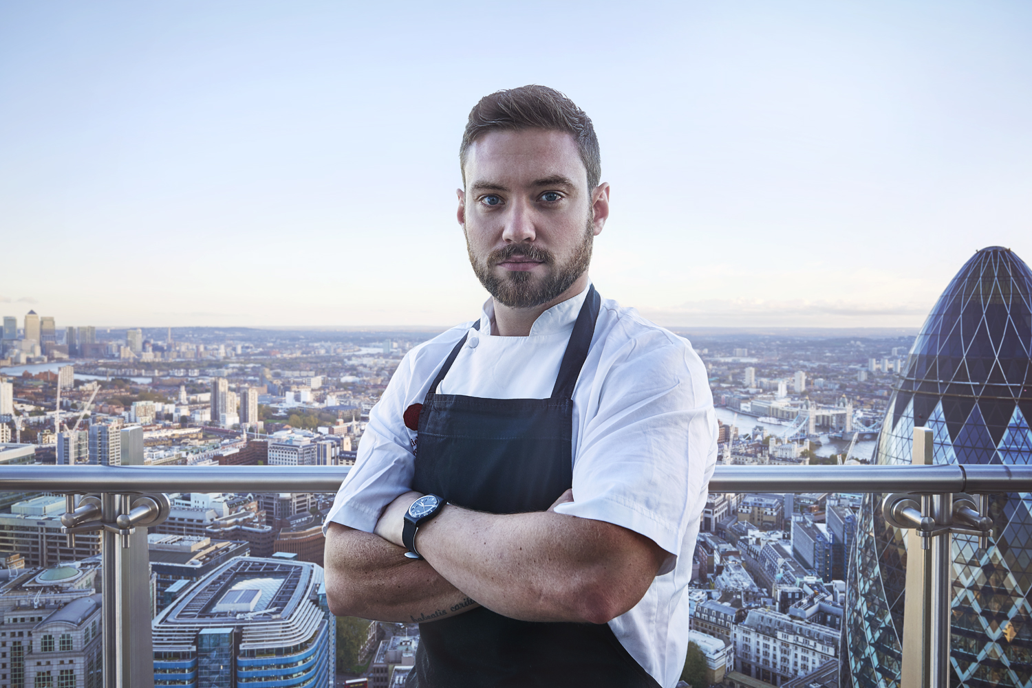 Dan Doherty - The Executive Chef at the Duck & Waffle in East London. He's shown here on the Duck & Waffle's 40th floor balcony.