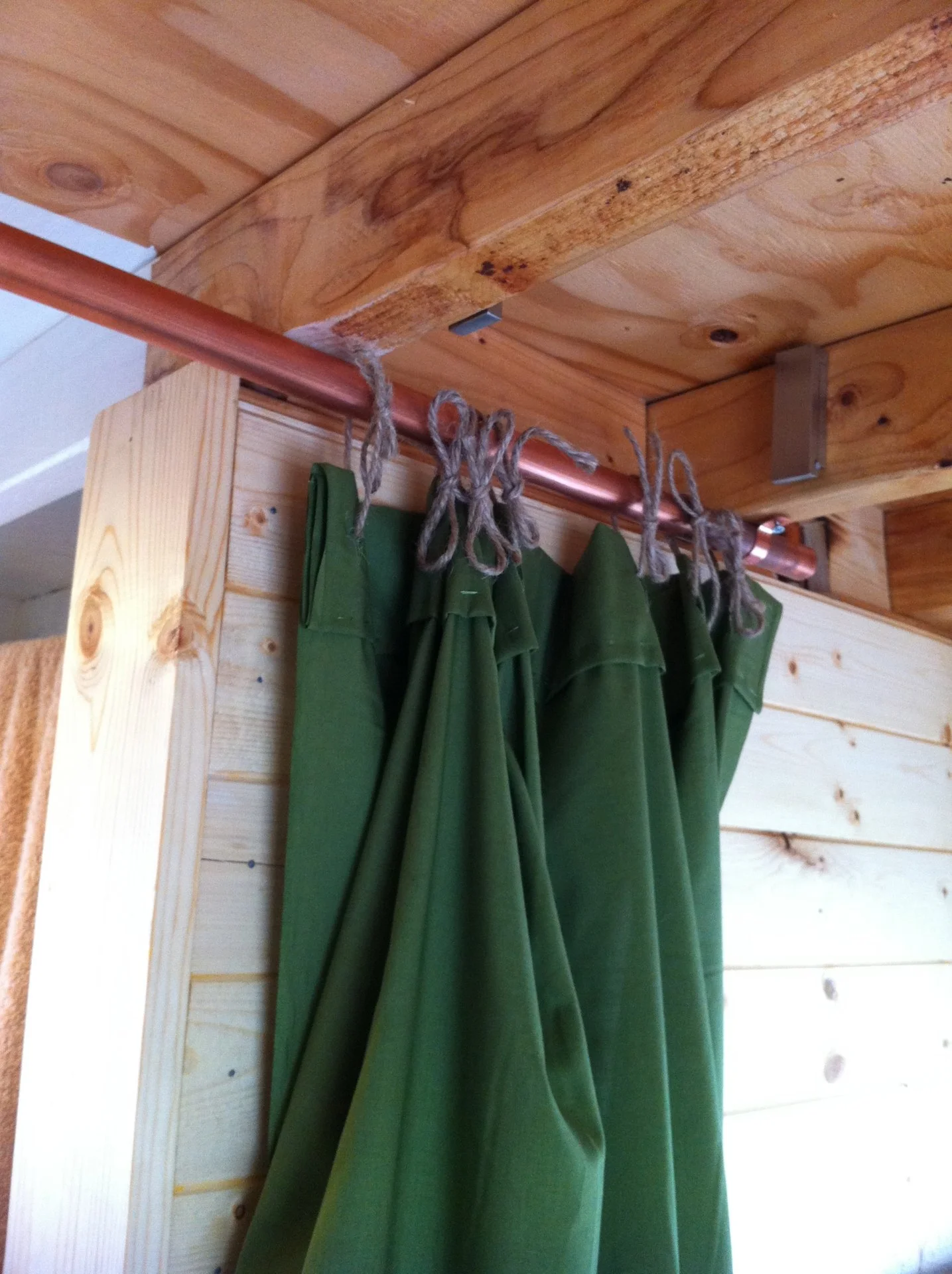 Used some simple fabric for the bathroom divider, and string to hold it all together, simple but complete!