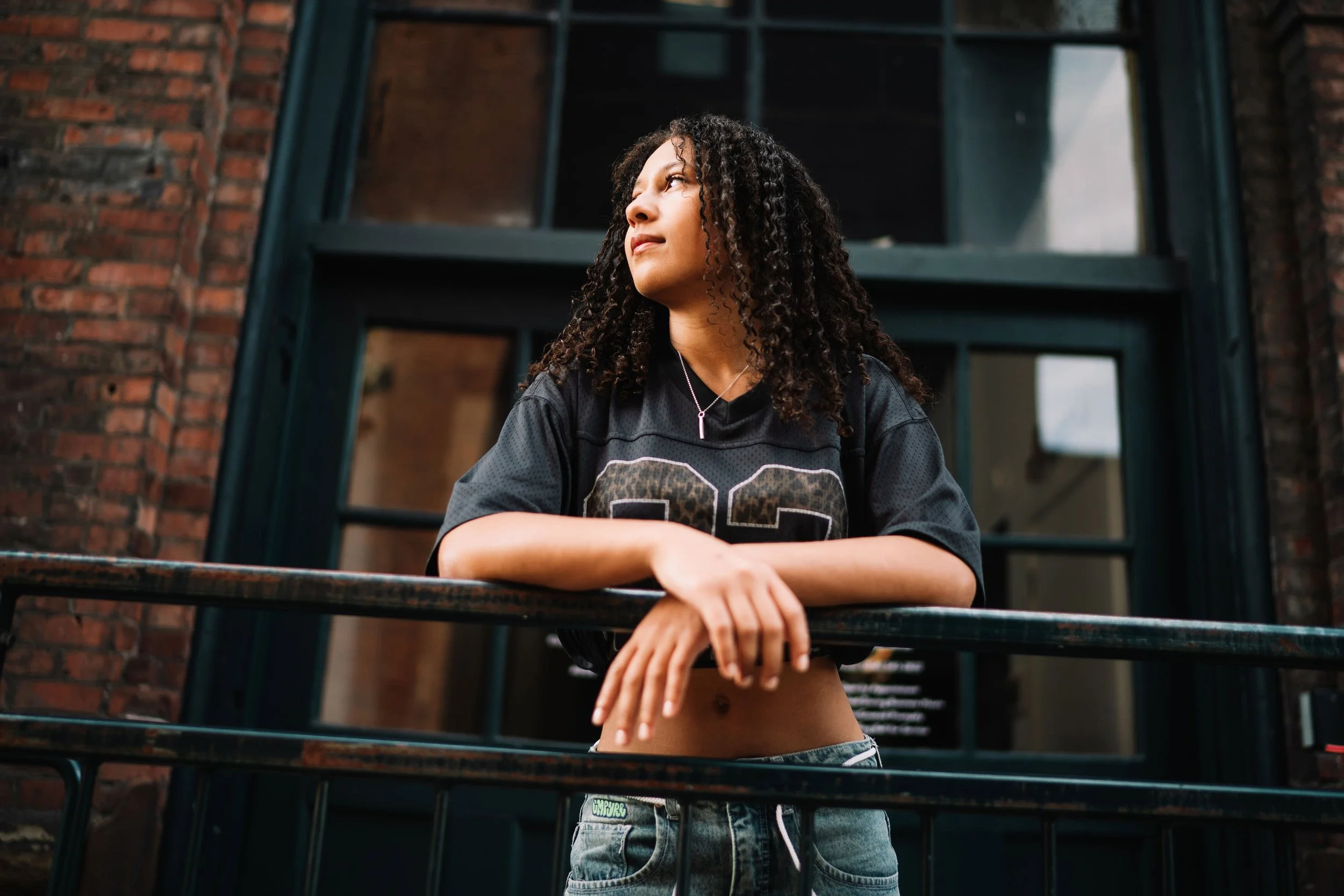 Senior girl portrait framed by industrial architecture in Georgetown Seattle