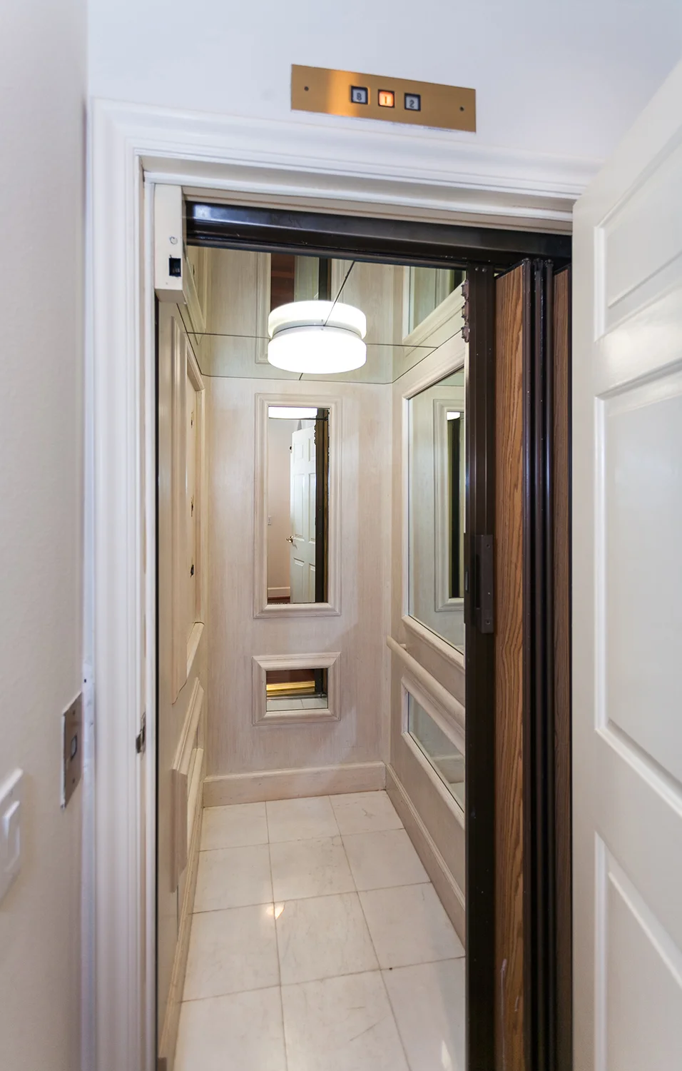 A fancy elevator to maneuver the 3 story home.