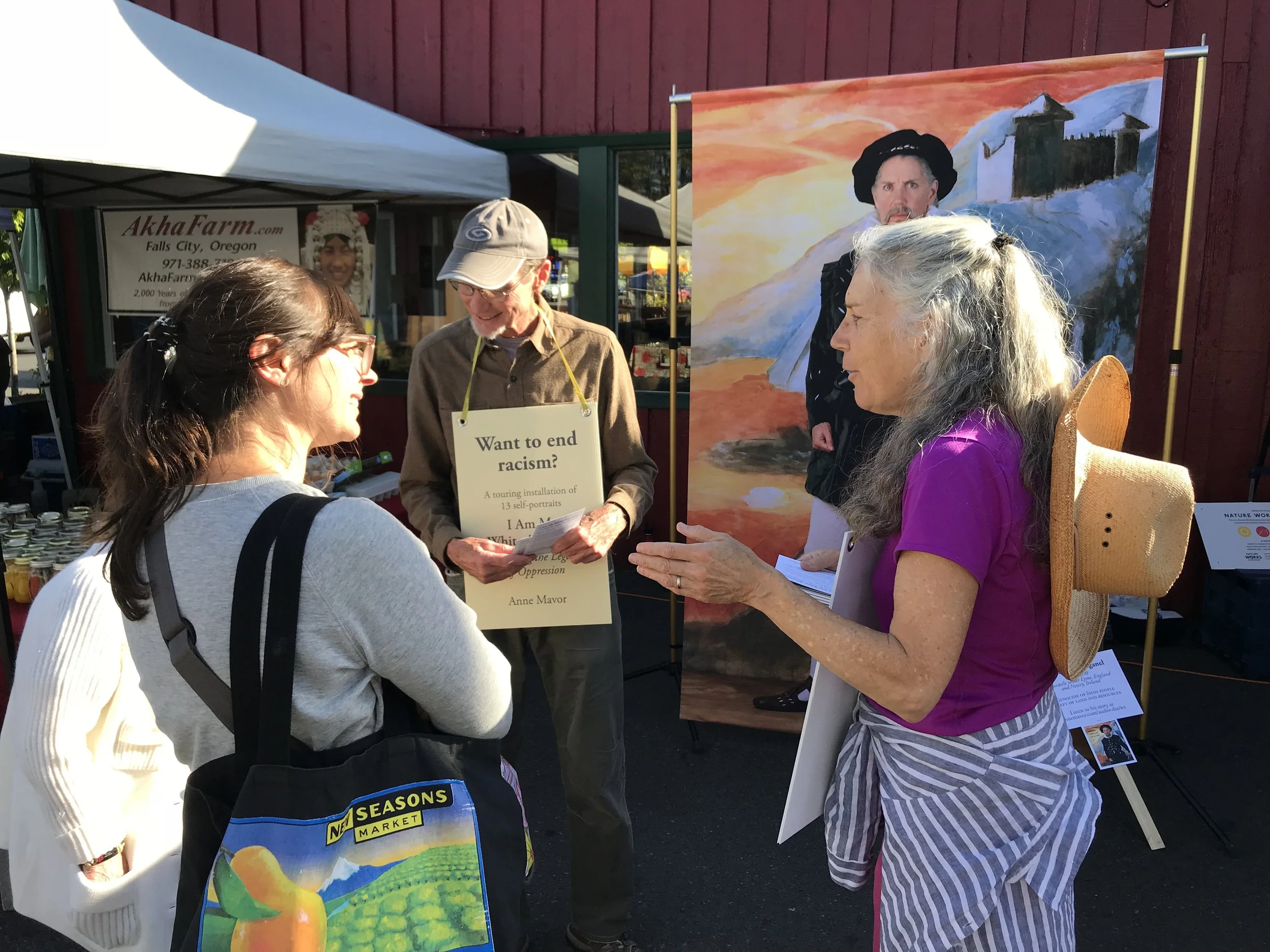 Doug Deaton and I talking to people at Cully Farmers Market in NE Portland.