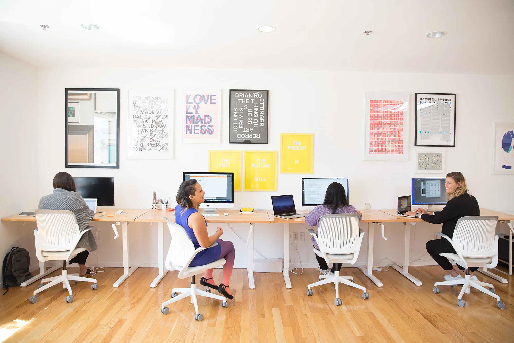 Anxy Magazine Founder Indhira Rojas (center) at Redindhi Studio in conversation with design team. Photo by Michelle Le.
