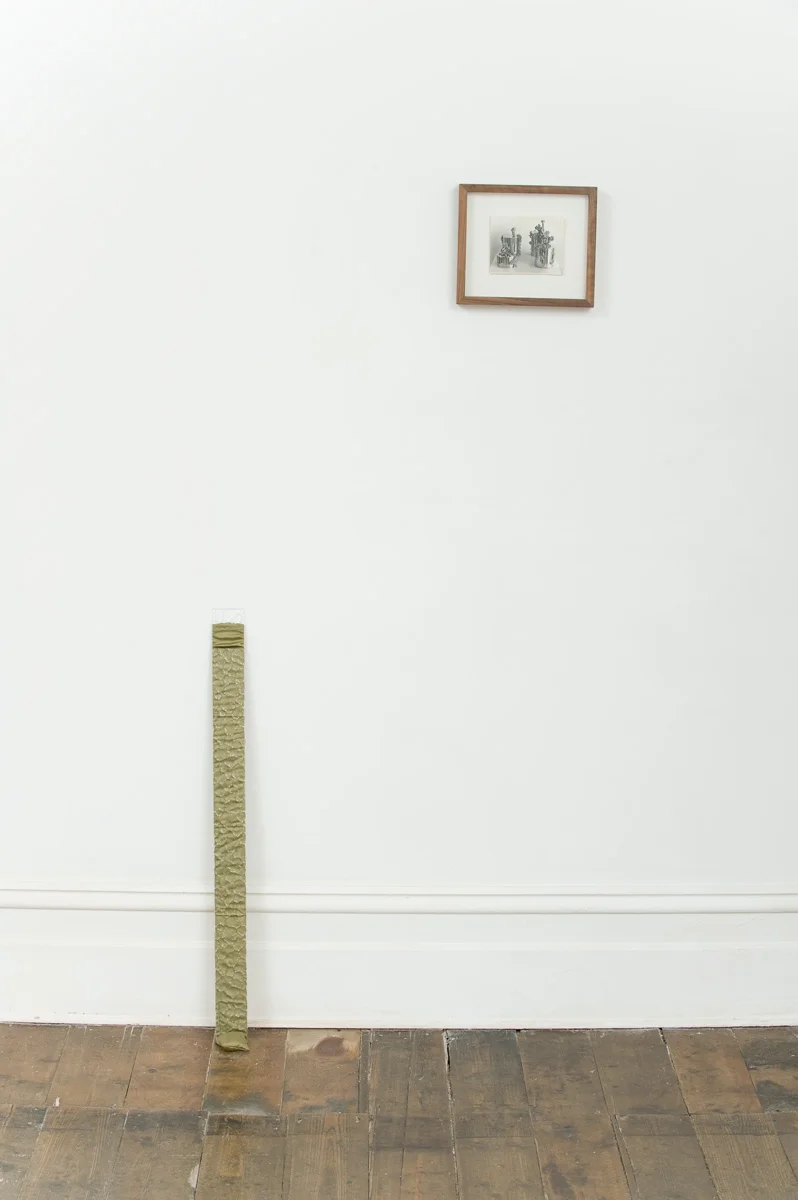(left) Skin Press 2011 silk, glass, sand (right) Fixed Prospect 2011 framed found photograph