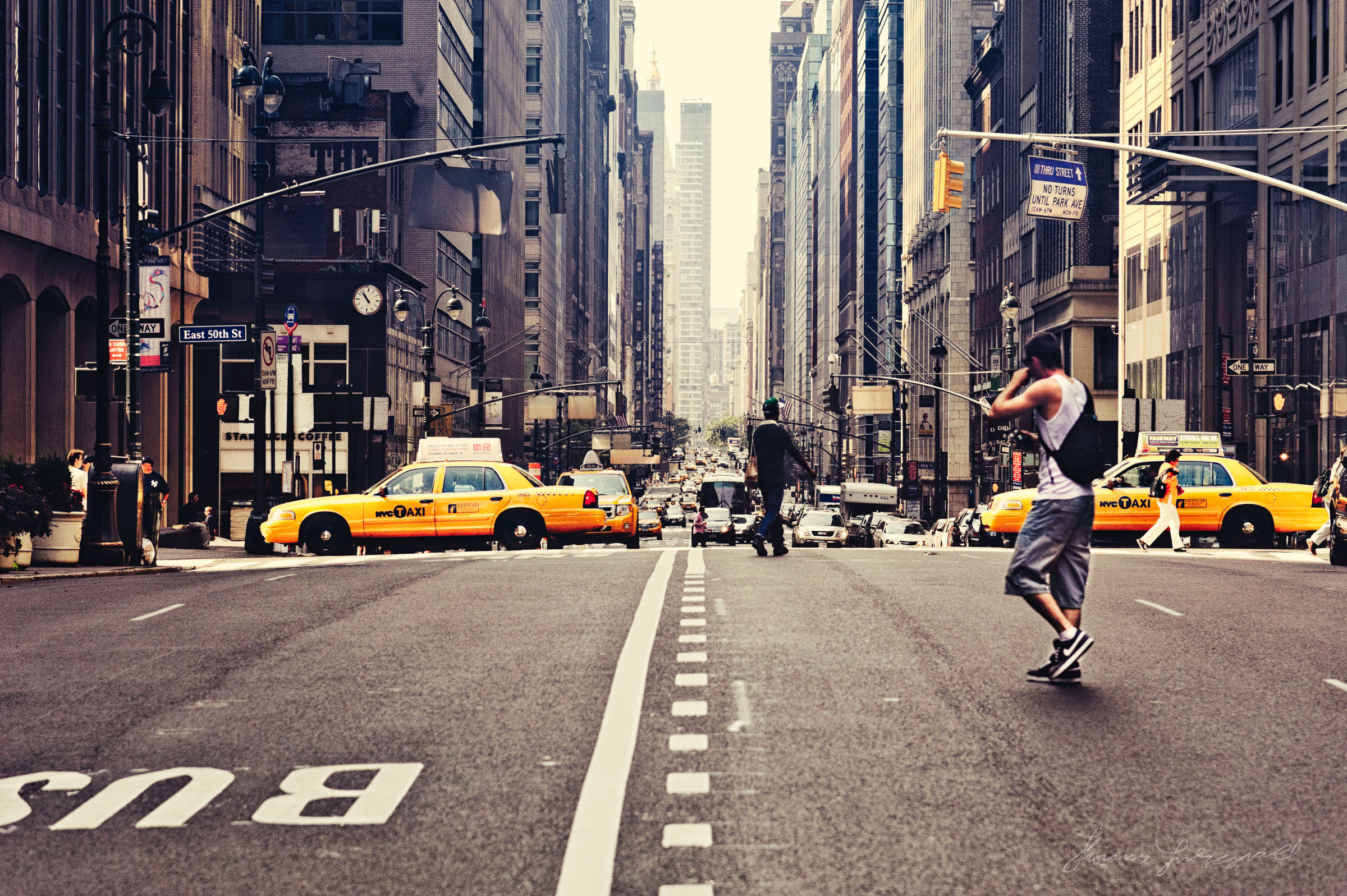 Guy crossing the Street in NYC