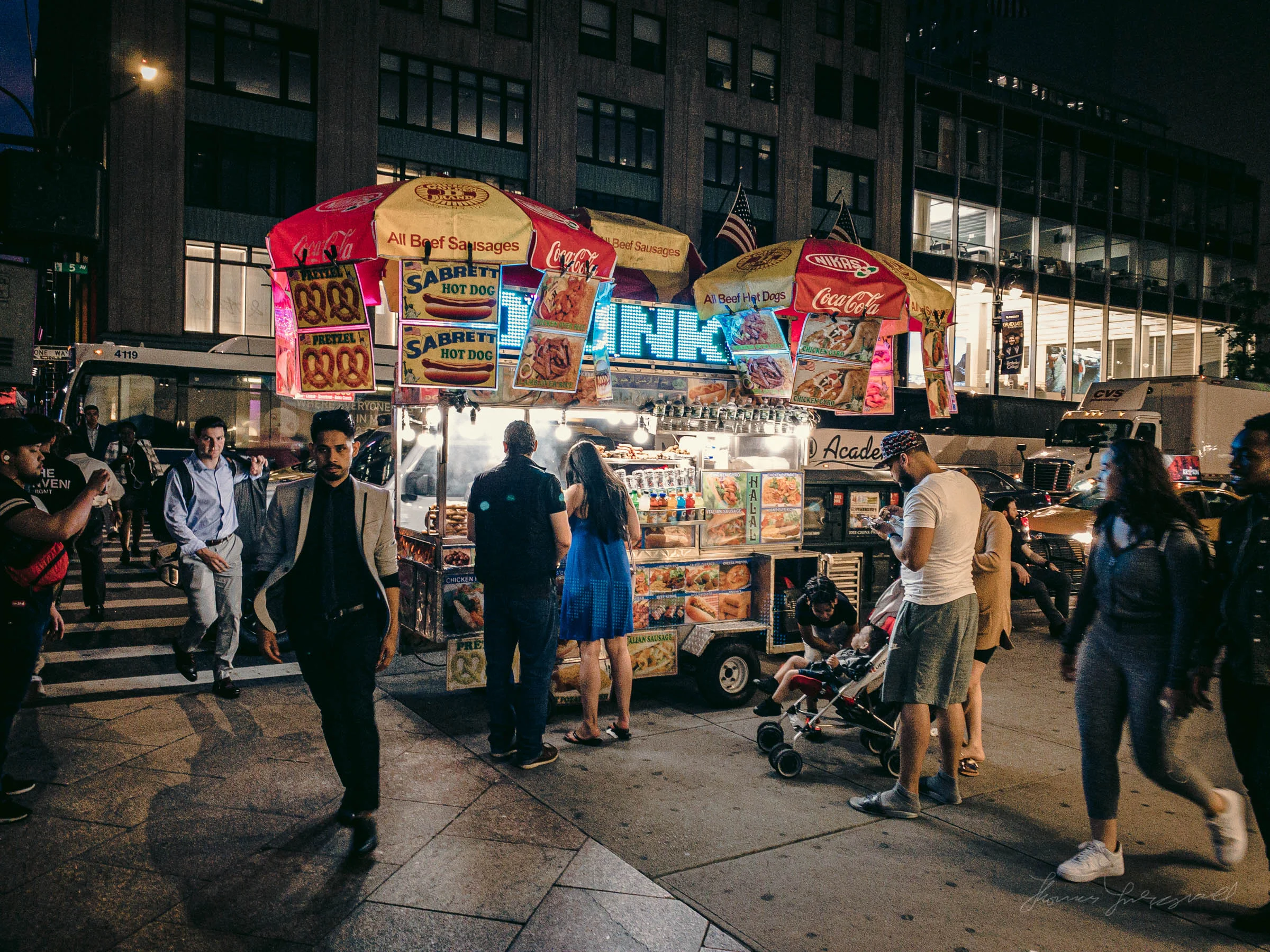 Hot Dog vendor on 5th Avenue at Night in NYC