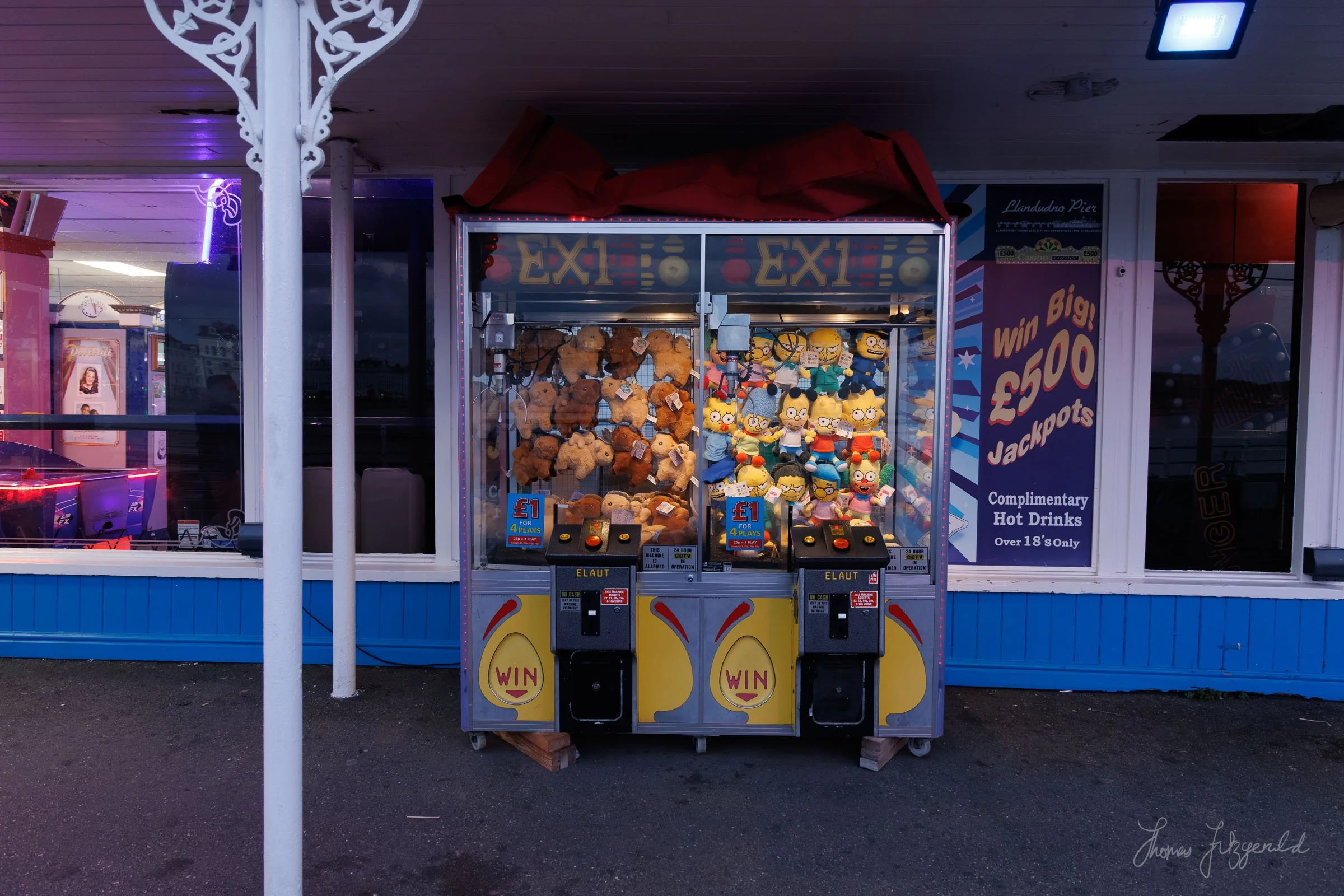 Claw Machine with Simpsons Characters on Llandudno Pier