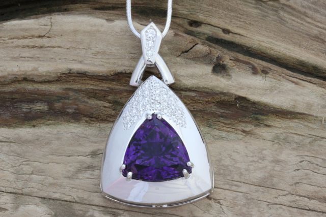 Amethyst and diamond pendant