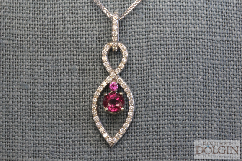 Ruby, pink sapphire and diamond pendant