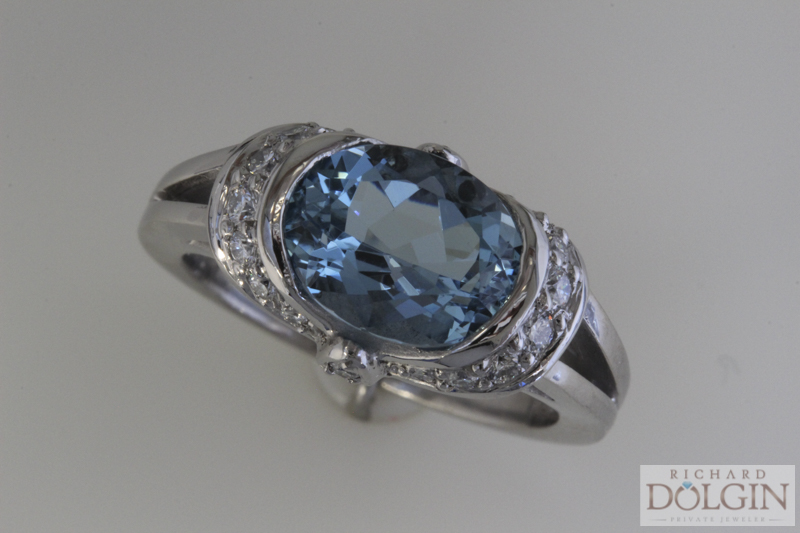 Blue zircon ring with diamond accents