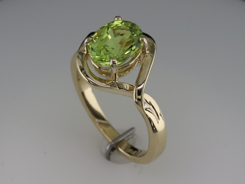 Peridot set in yellow gold