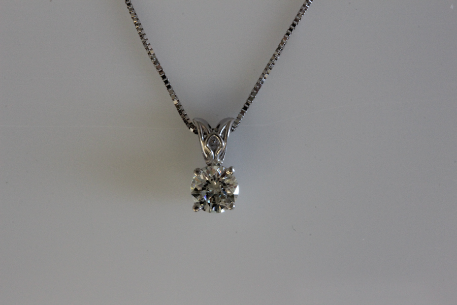 Diamond solitaire pendant