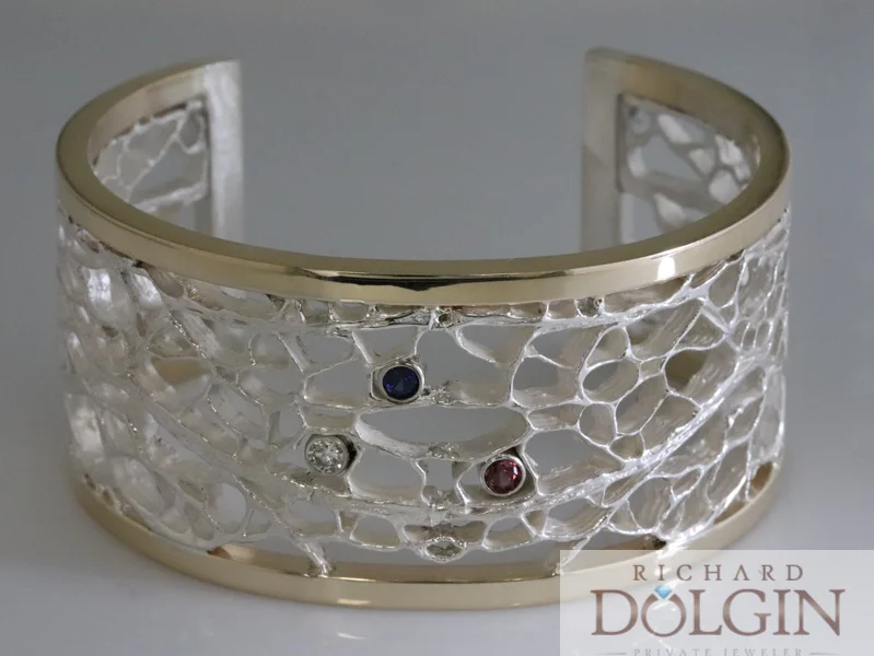 Sterling silver cactus core bracelet with 14 karat yellow gold border