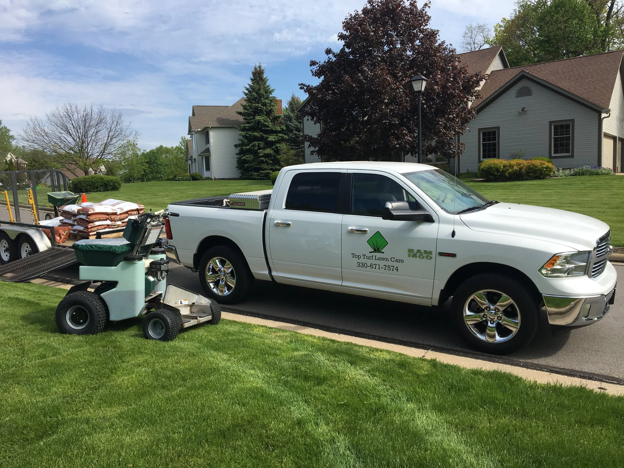 Lawn care service in Green Ohio 330-671-7574 Top Turf Lawn Care