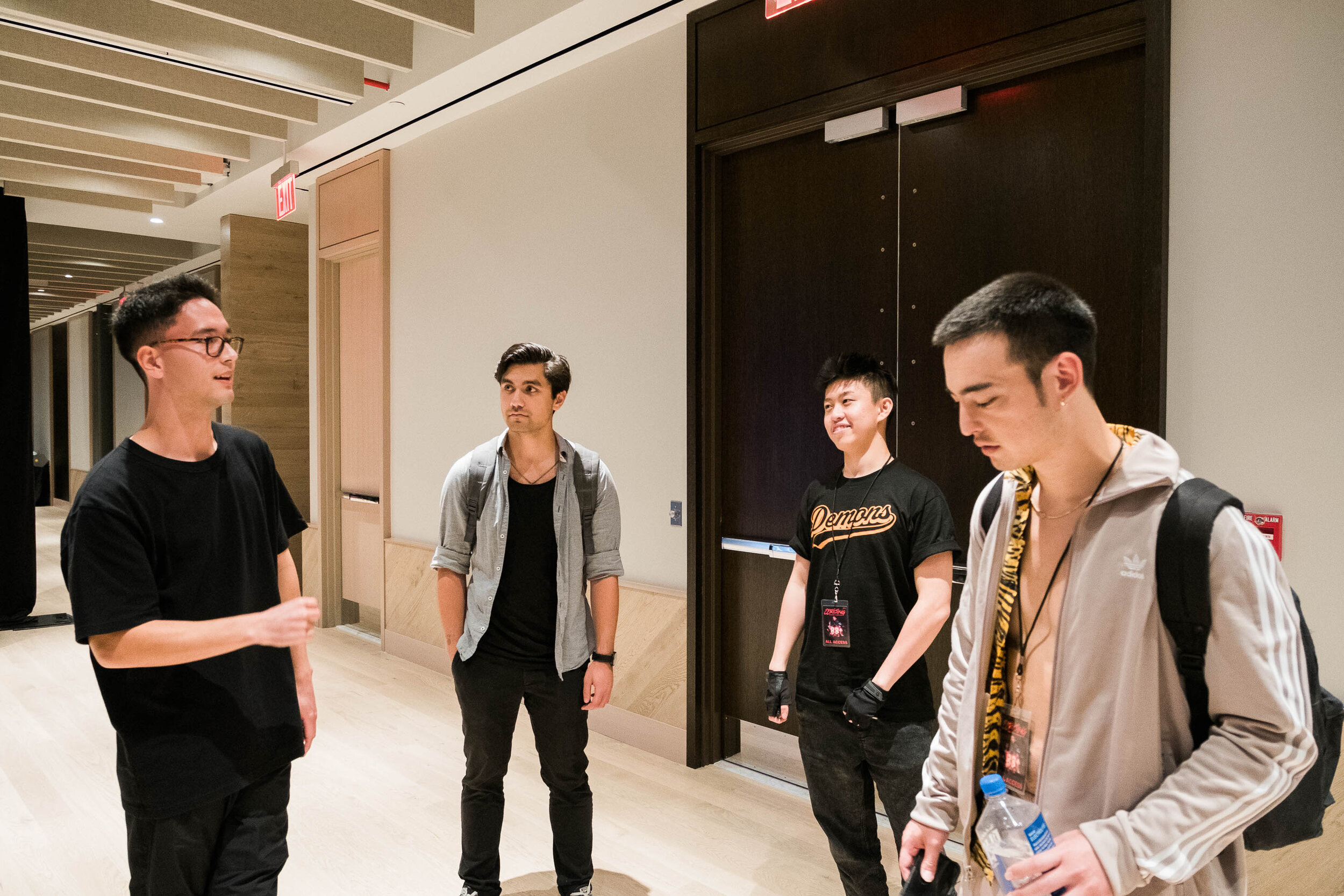  Backstage, 88rising’s biggest name artists, Joji, right, and Rich Brian, debate the merits of Brockhampton, another of-the-moment hip-hop collective, with others in the company’s orbit. 