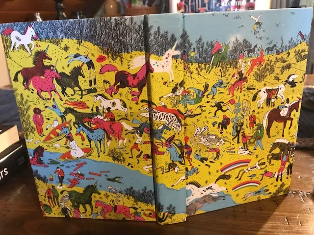 Under the slipcover of ZOMBIES VS. UNICORNS