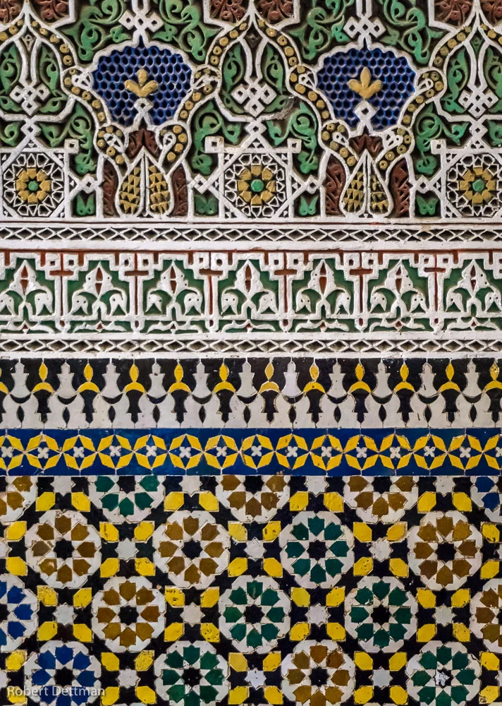 Detail of mosaics including three dimensional relief in the upper section.