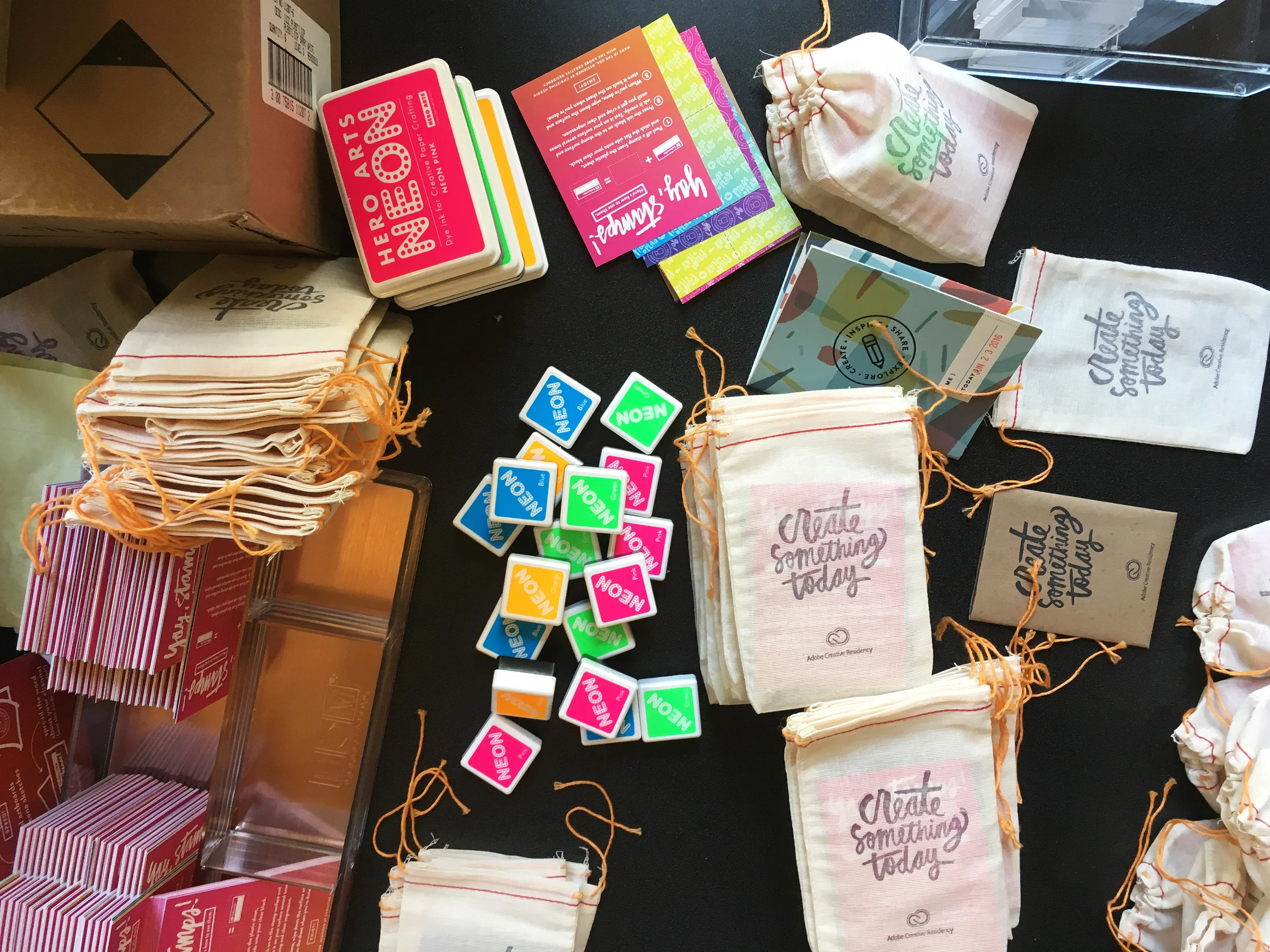 Our assembly table at Adobe — six hands are better than two! Thanks, Libby and Heidi! ;)