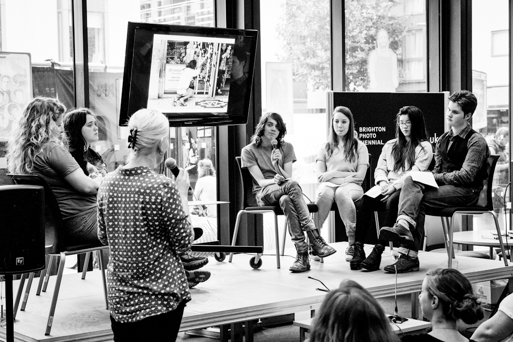Participants from Evolving in Conversation take the stage to discuss the project in a panel discussion at Brighton Jubilee Library.