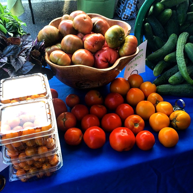  Elm Street Gardens tomatoes call to customers at the Morningside Farmers Market in Atlanta on Saturdays.