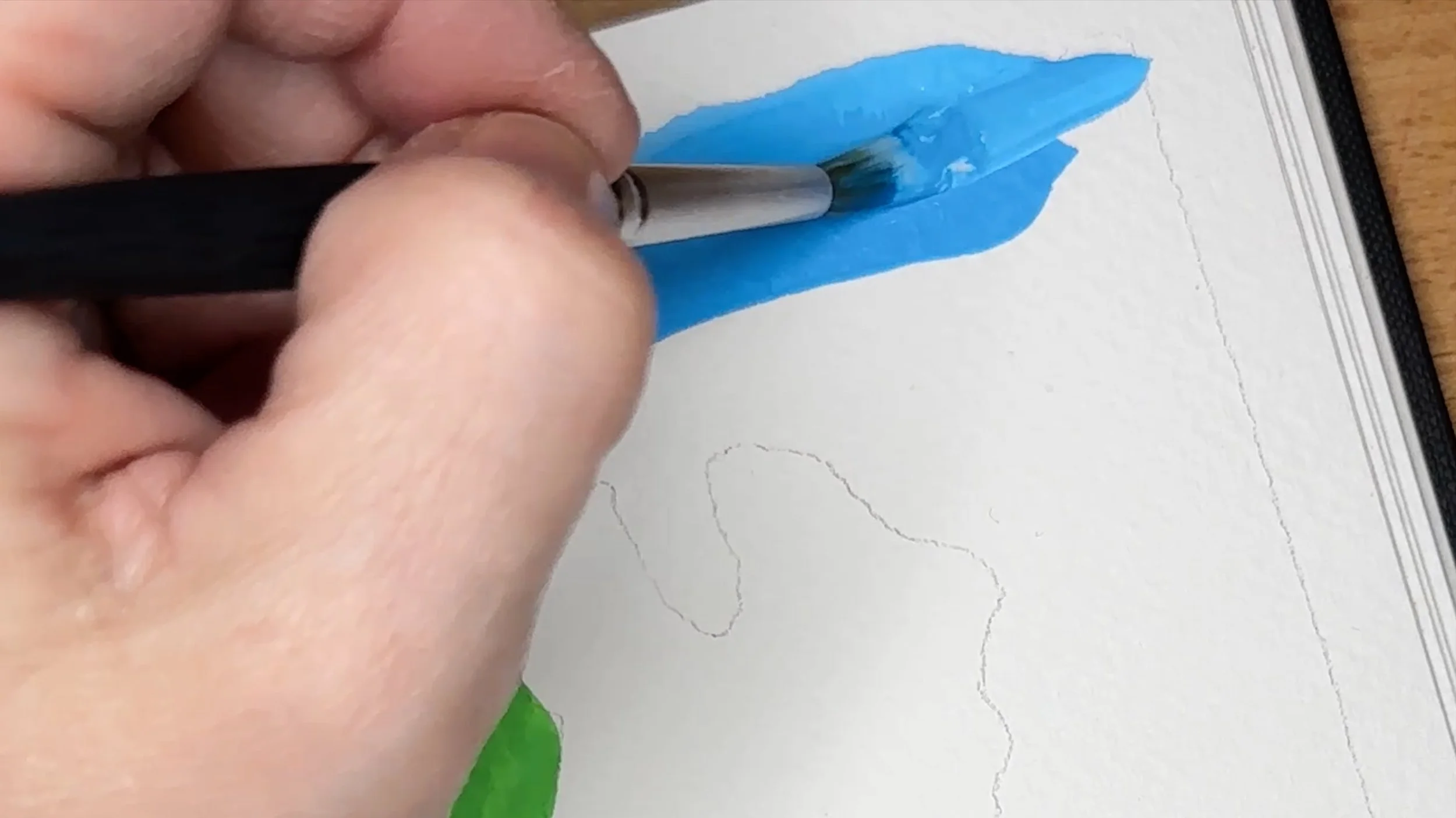 Tube gouache paints on palette used to create  botanical leaf painting