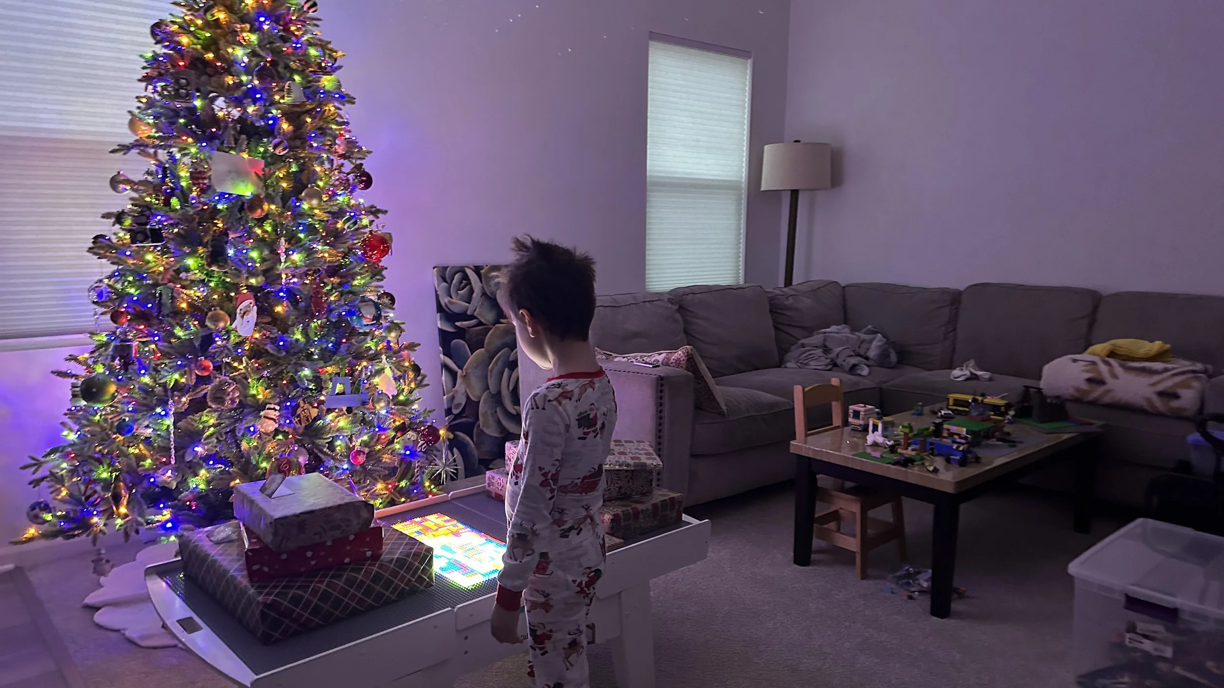 Christmas morning at home, with our tree lit and presents waiting.