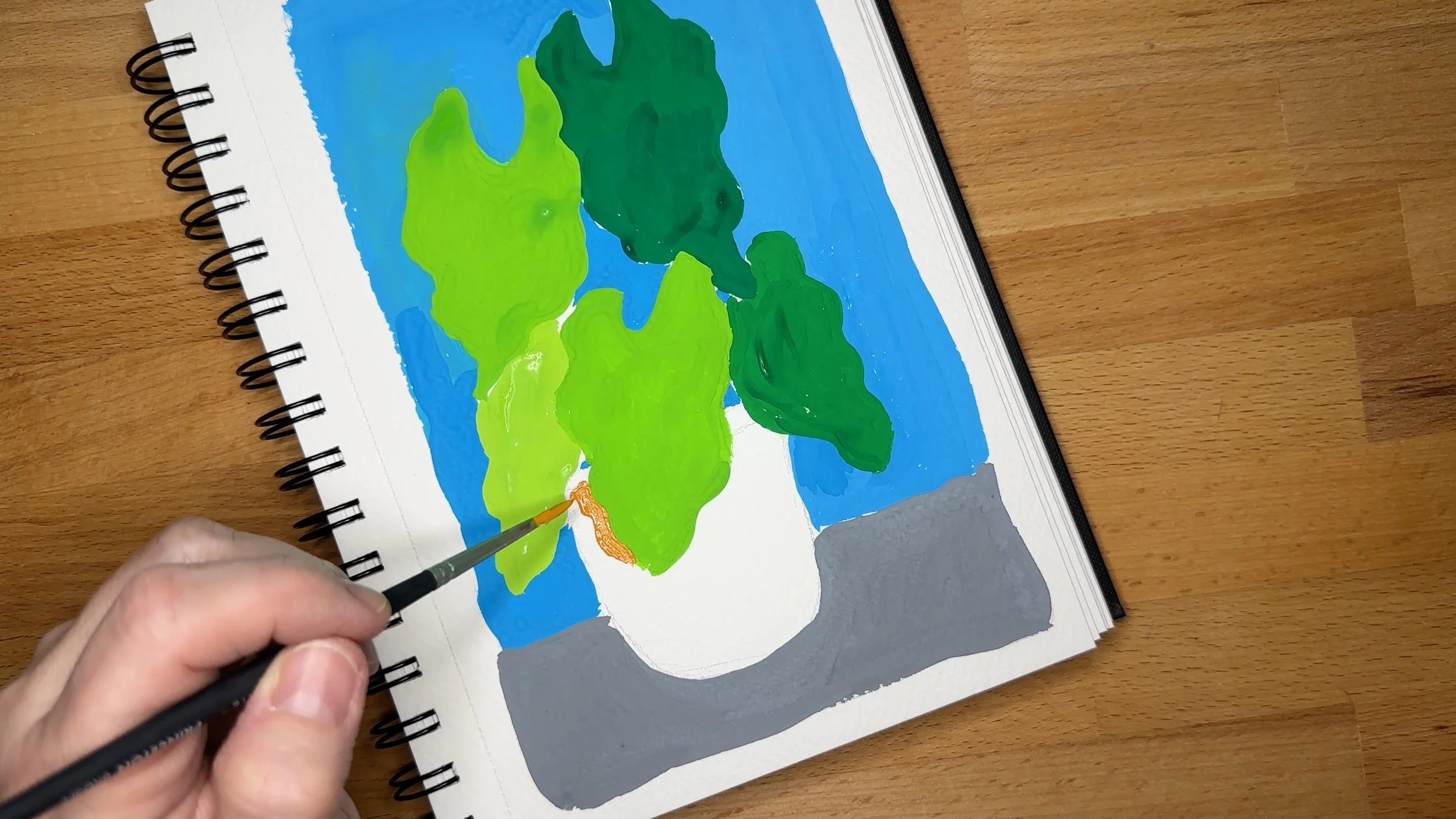 Mid progress gouache painting with layered green leaves and developing details