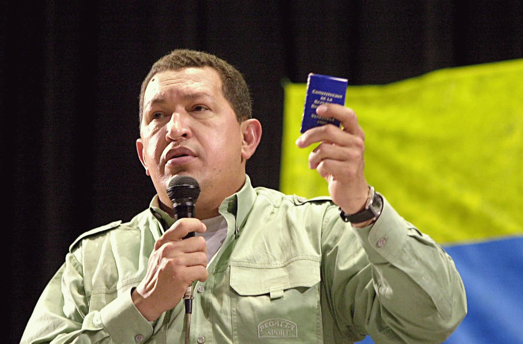 Chávez holds a miniature copy of the 1999 Venezuelan Constitution at the 2005 World Social Forum held in Brazil. (photo and caption from Wikipedia)