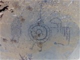 An image I took in 2007 at PNM. I reversed the images and played with the levels to get the petroglyphs to pop out. It's no DStretch, but, it worked.