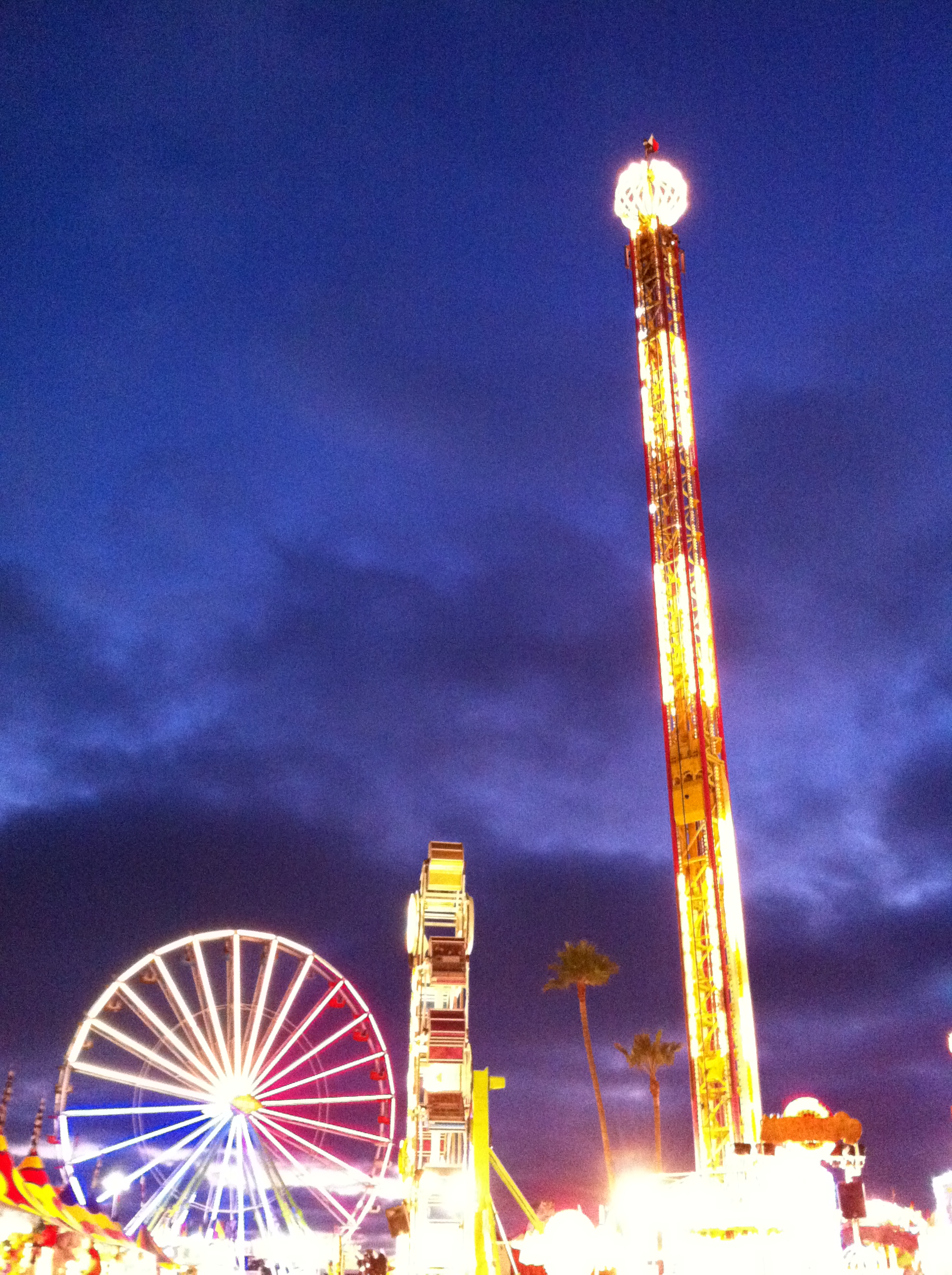 Madeline Lovejoy - Rollercoasters and ferris wheels and rides make me feel alive, exhilarated and a little scared, and totally caught in the moment and the thrill, able to regain a sense of wonder. "...and I am perpetually awaiting a rebirth of wonder." ~excerpt from Lawrence Ferlinghetti's 'I Am Waiting', from "Coney Island of the Mind." photo taken at the San Diego fair, 2011.