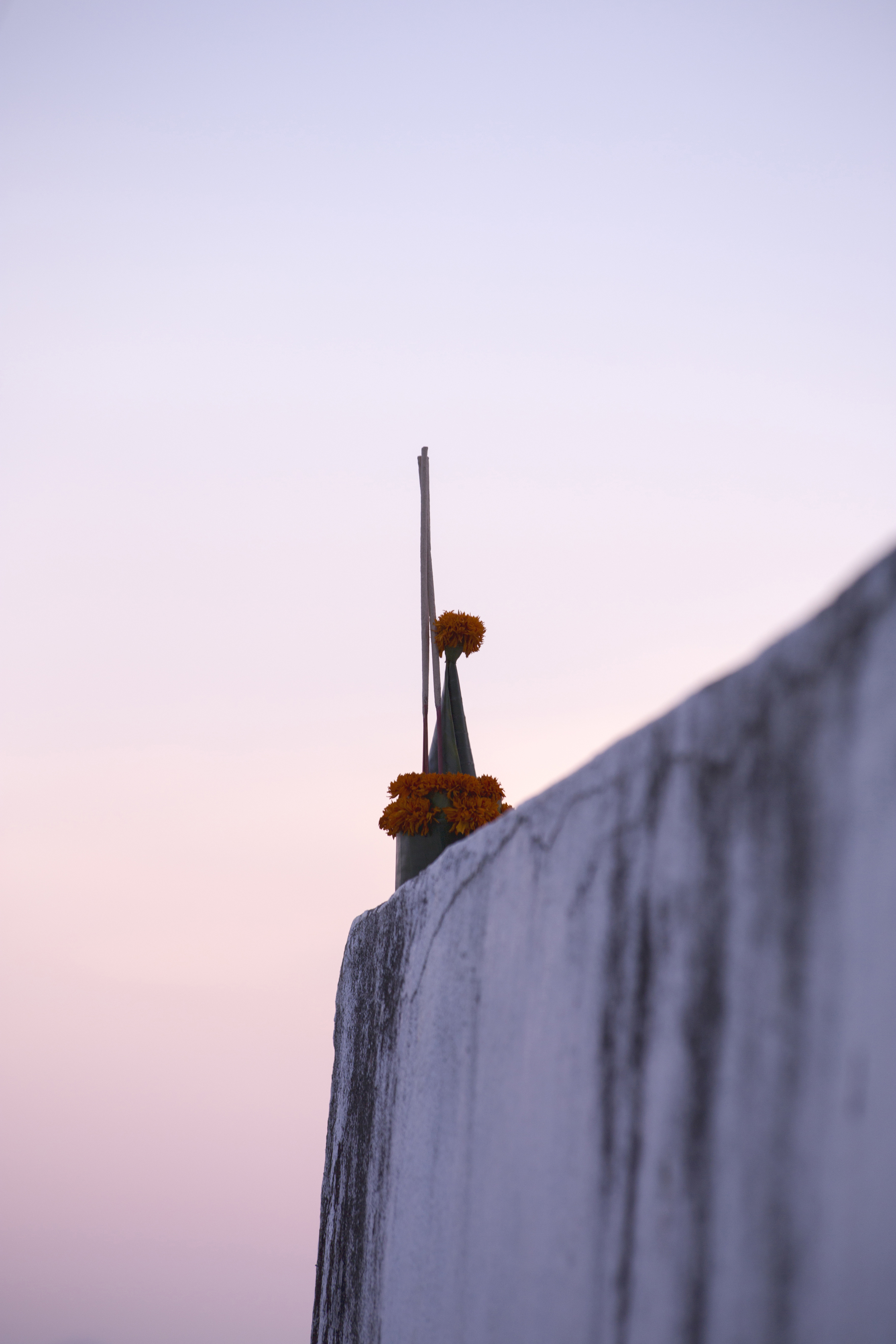 Julie Cimpko - A serene moment – a buddhist offering at dusk on the very top of Mount Phousi in Luang Prabang, Laos.
