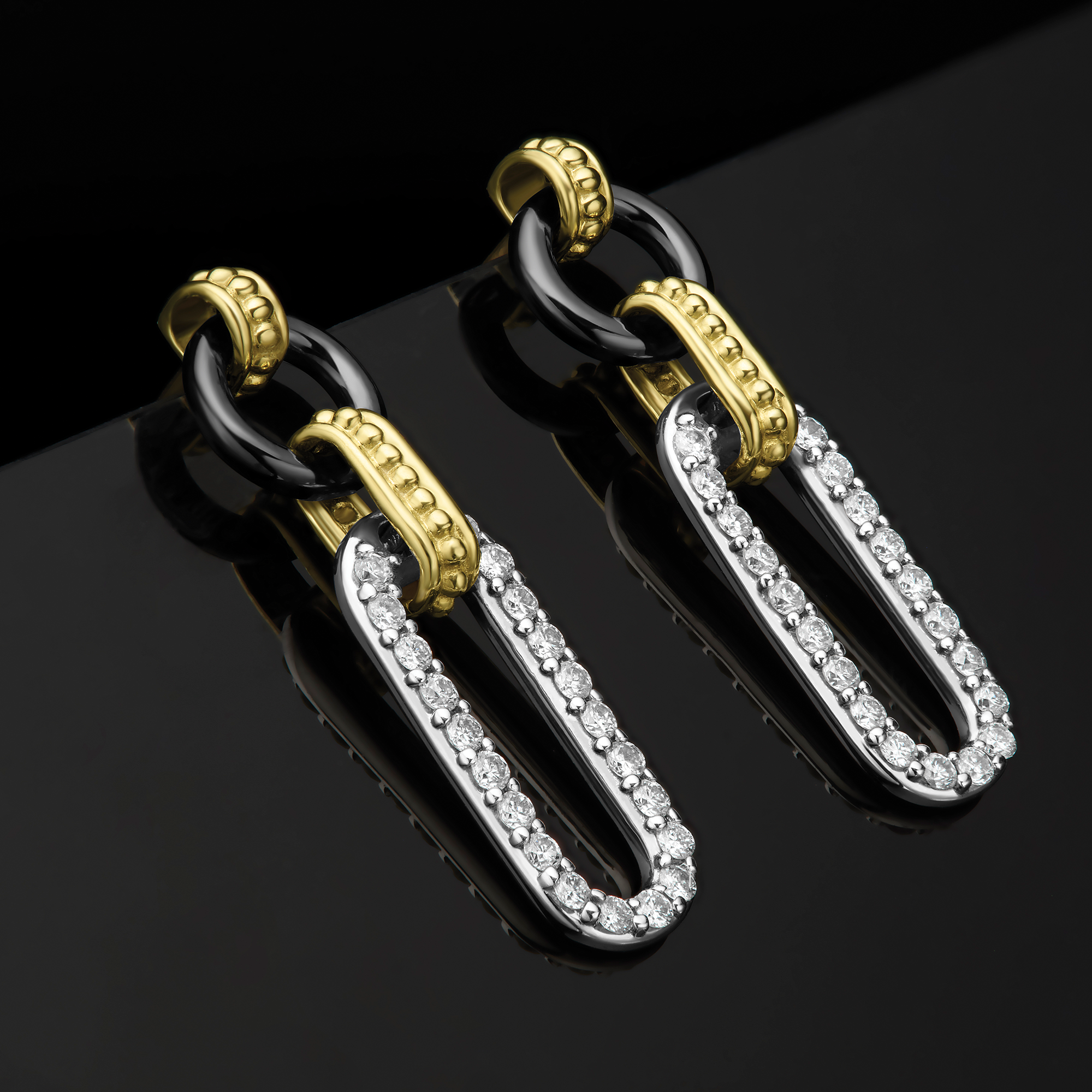 Fall24_Craftsmanship_Link_Diamond_Earrings.png