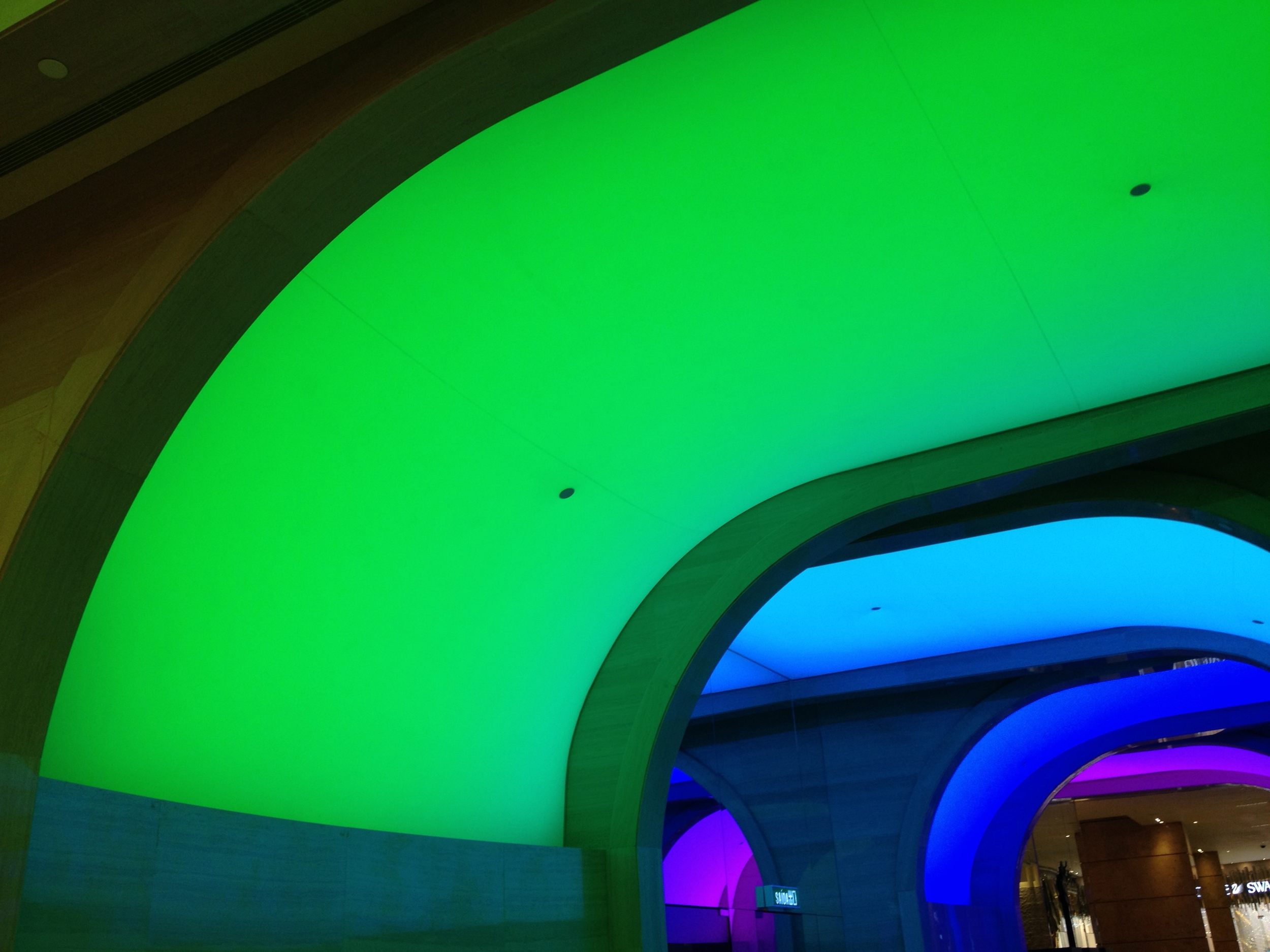 Shopping Arcade with color changing Illuminated archways at the MG Macau - detail