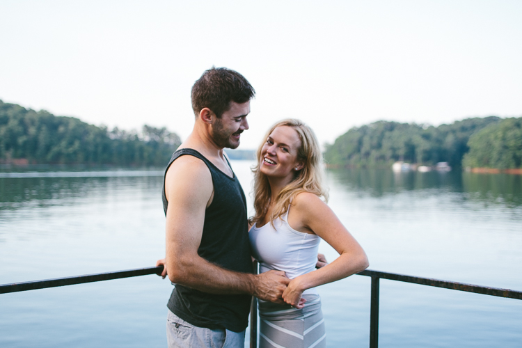 Happy Engaged Couple by the Water