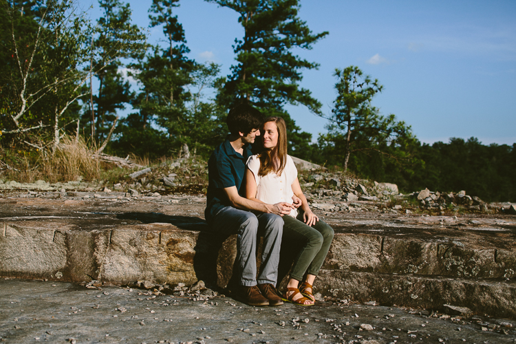 Engaged Couple Sitting Down