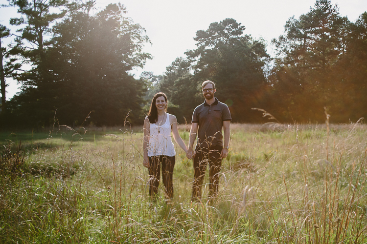 Couple Holding Hands in a Field