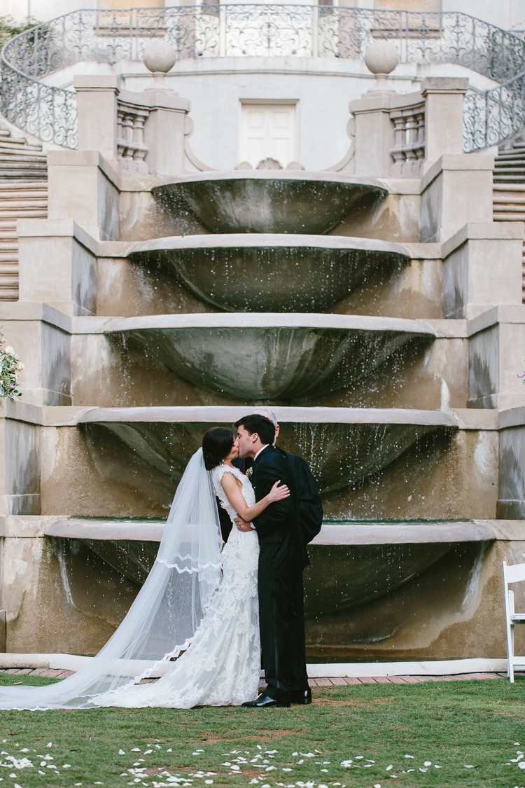 Bride and Groom Kiss at Fairytale Swan House Wedding