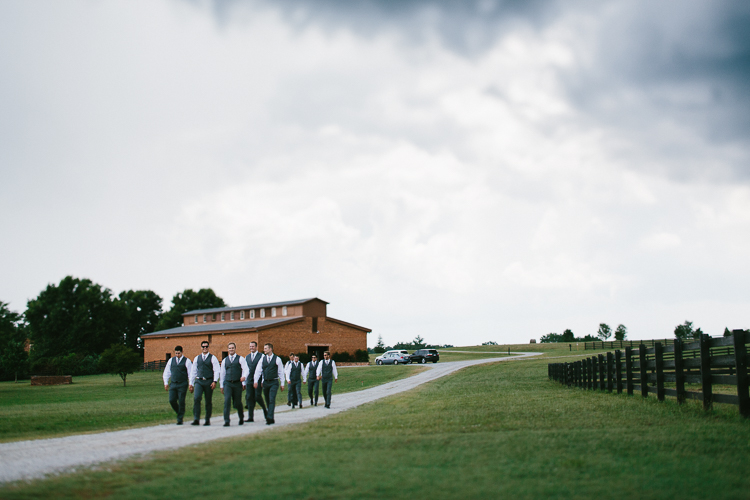 The Groomsmen Walking Through the Farm